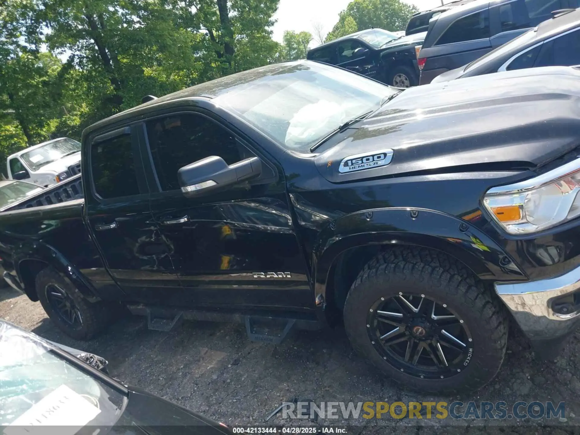 13 Photograph of a damaged car 1C6SRFBT0LN280347 RAM 1500 2020