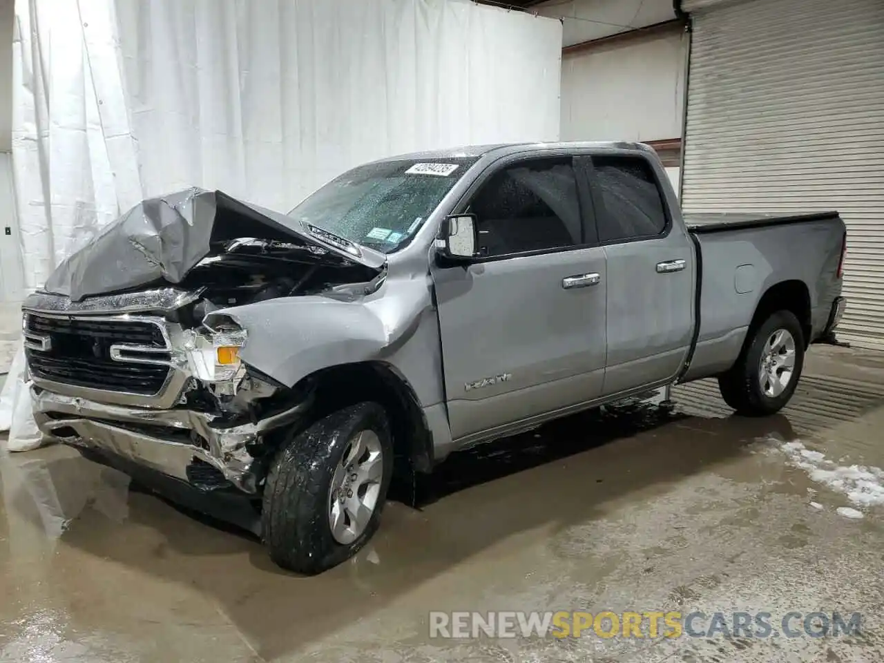 1 Photograph of a damaged car 1C6SRFBT3LN198404 RAM 1500 2020