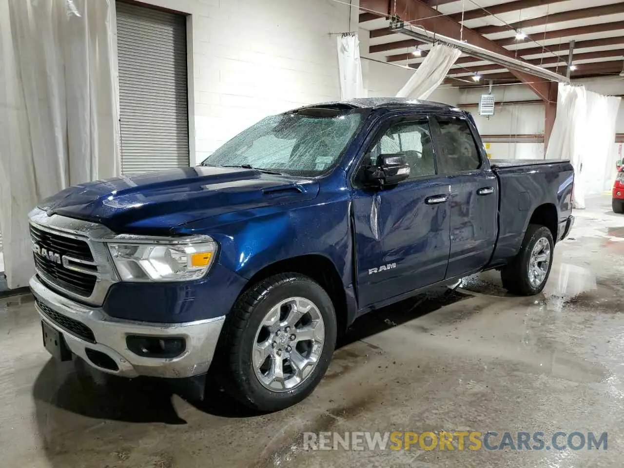 1 Photograph of a damaged car 1C6SRFBT6LN215650 RAM 1500 2020