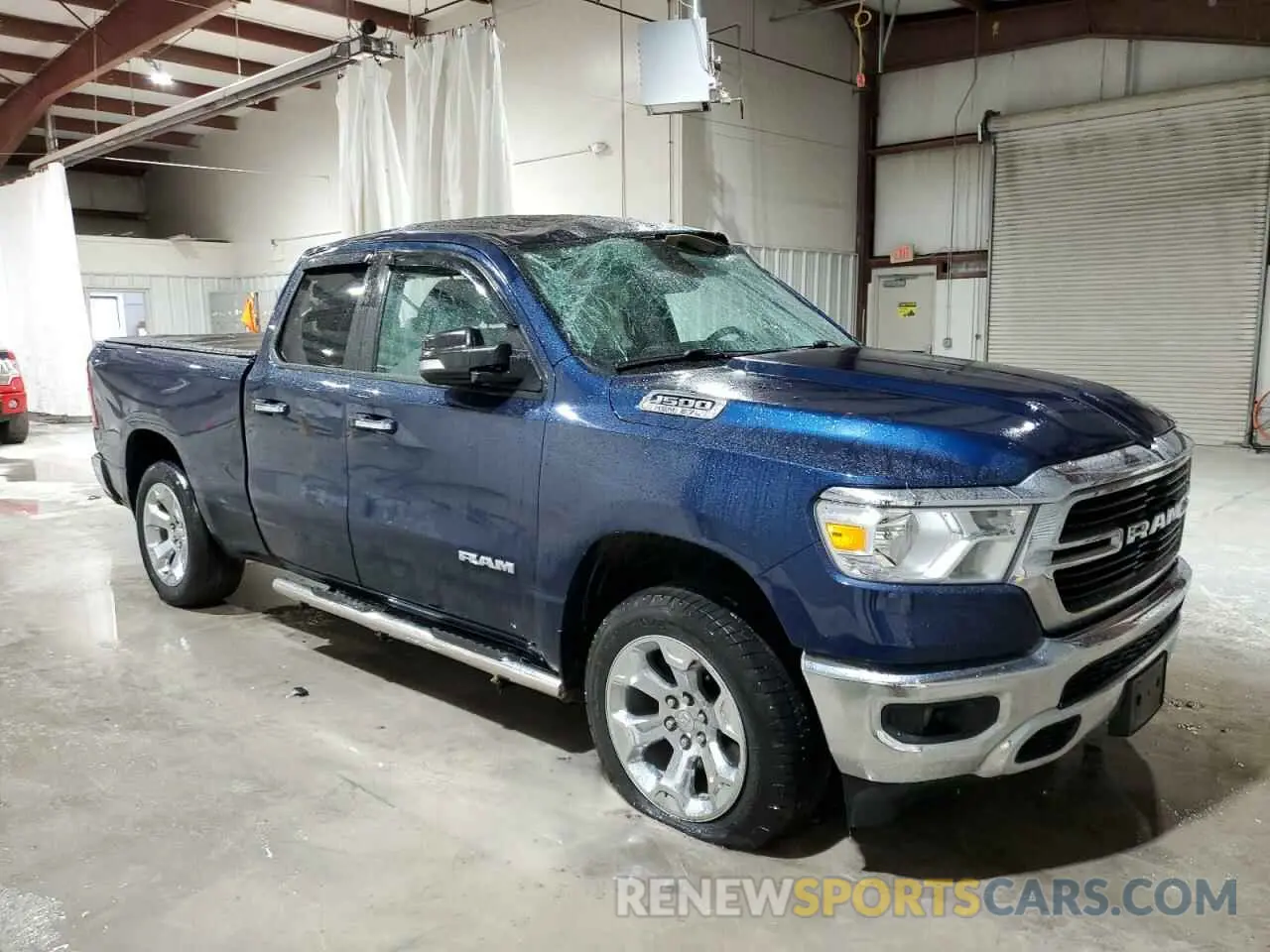 4 Photograph of a damaged car 1C6SRFBT6LN215650 RAM 1500 2020