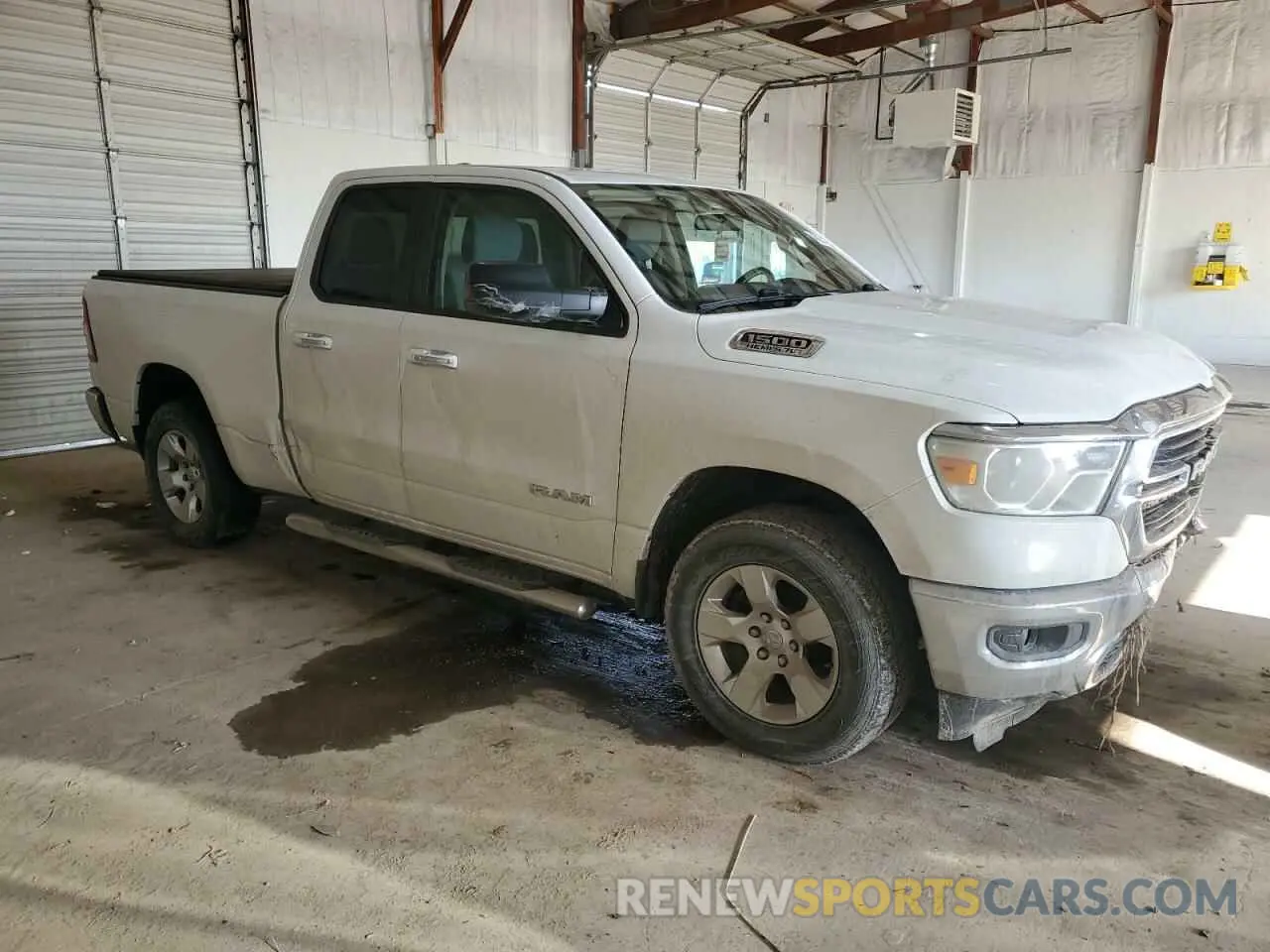 4 Photograph of a damaged car 1C6SRFBT7LN190032 RAM 1500 2020