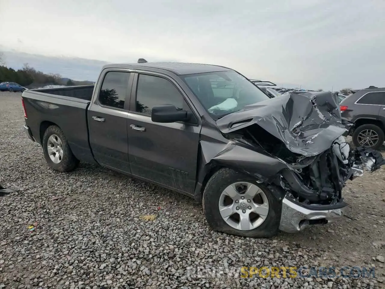 4 Photograph of a damaged car 1C6SRFBT7LN404601 RAM 1500 2020
