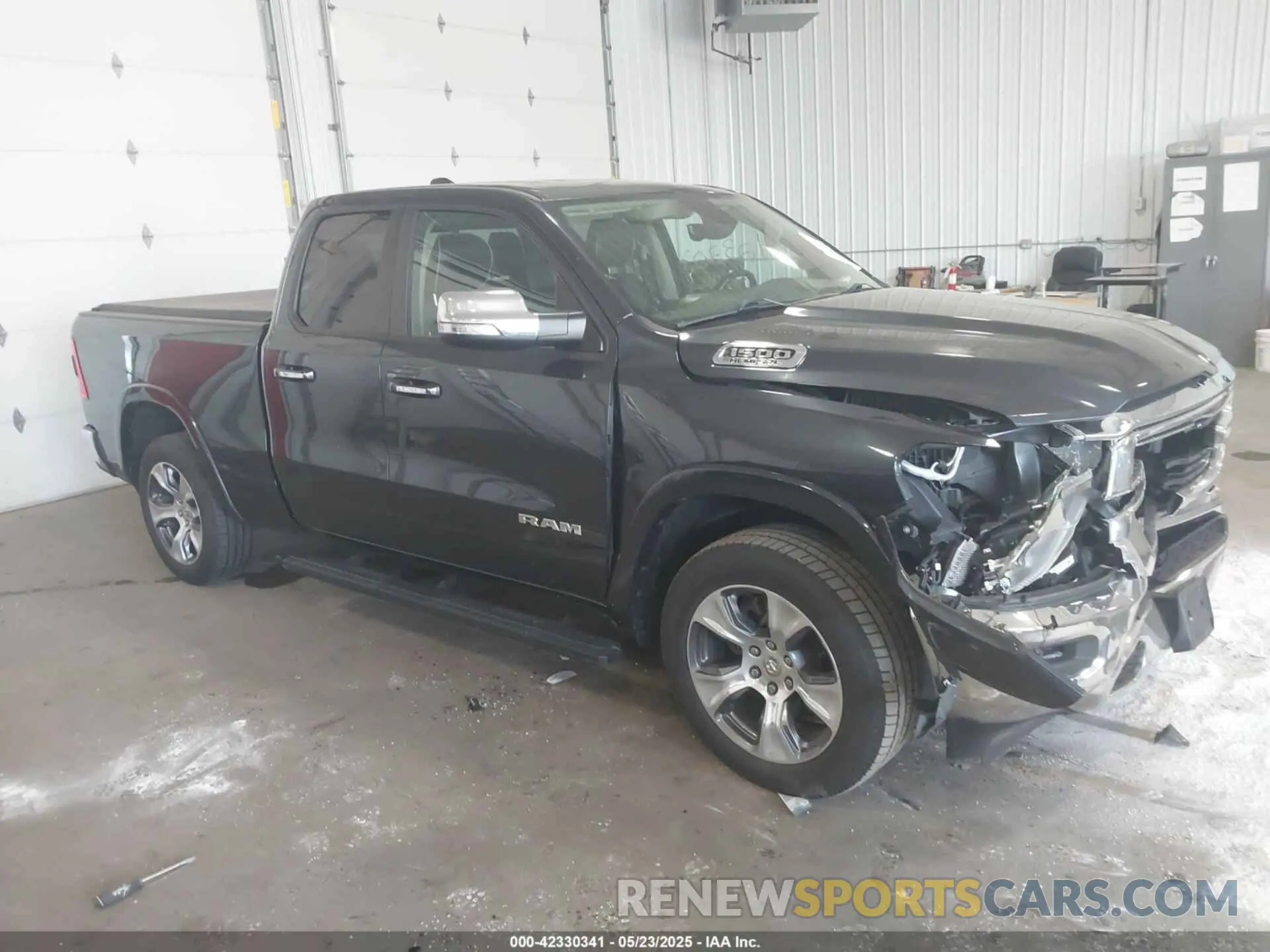 1 Photograph of a damaged car 1C6SRFDT7LN142009 RAM 1500 2020