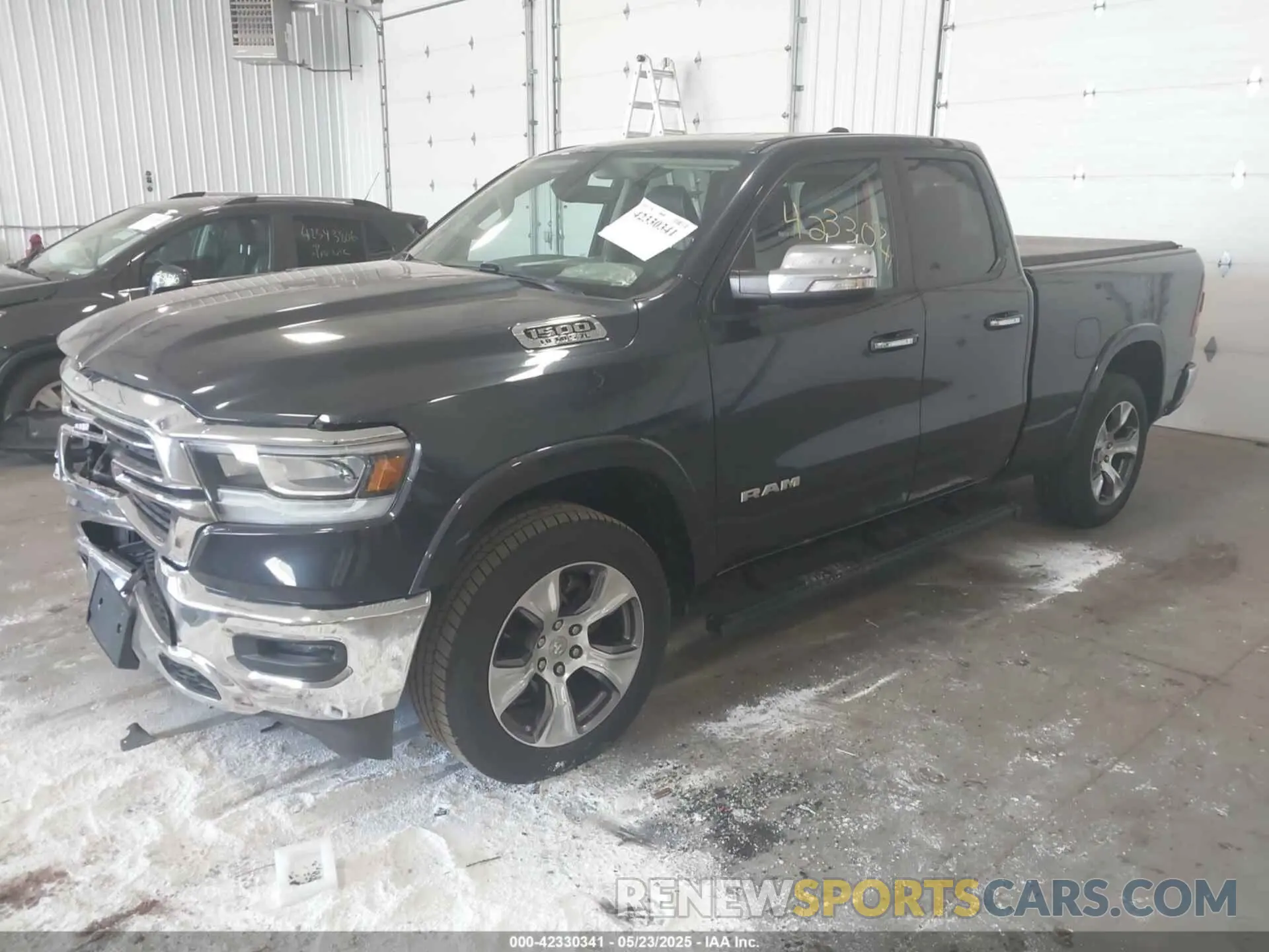 2 Photograph of a damaged car 1C6SRFDT7LN142009 RAM 1500 2020