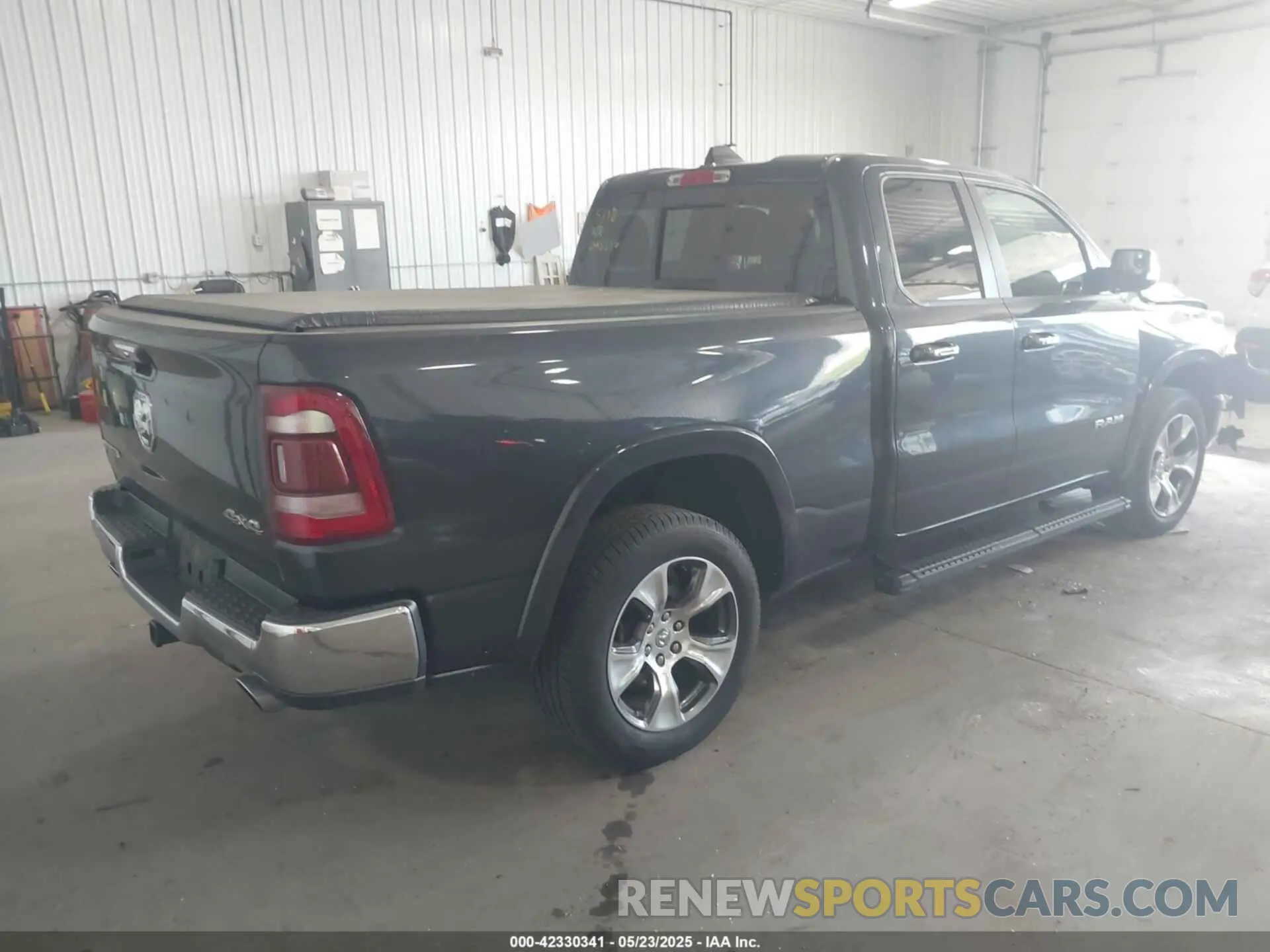 4 Photograph of a damaged car 1C6SRFDT7LN142009 RAM 1500 2020