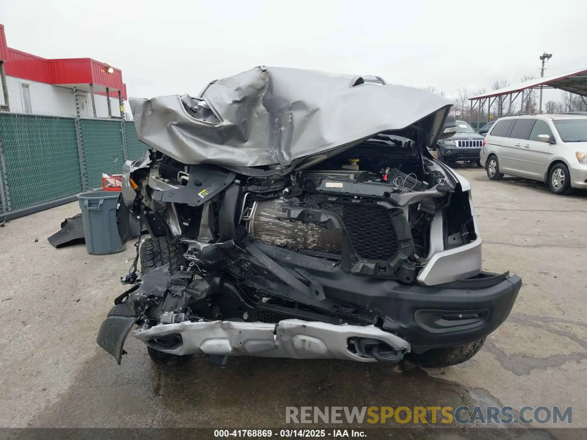 12 Photograph of a damaged car 1C6SRFET1LN114950 RAM 1500 2020