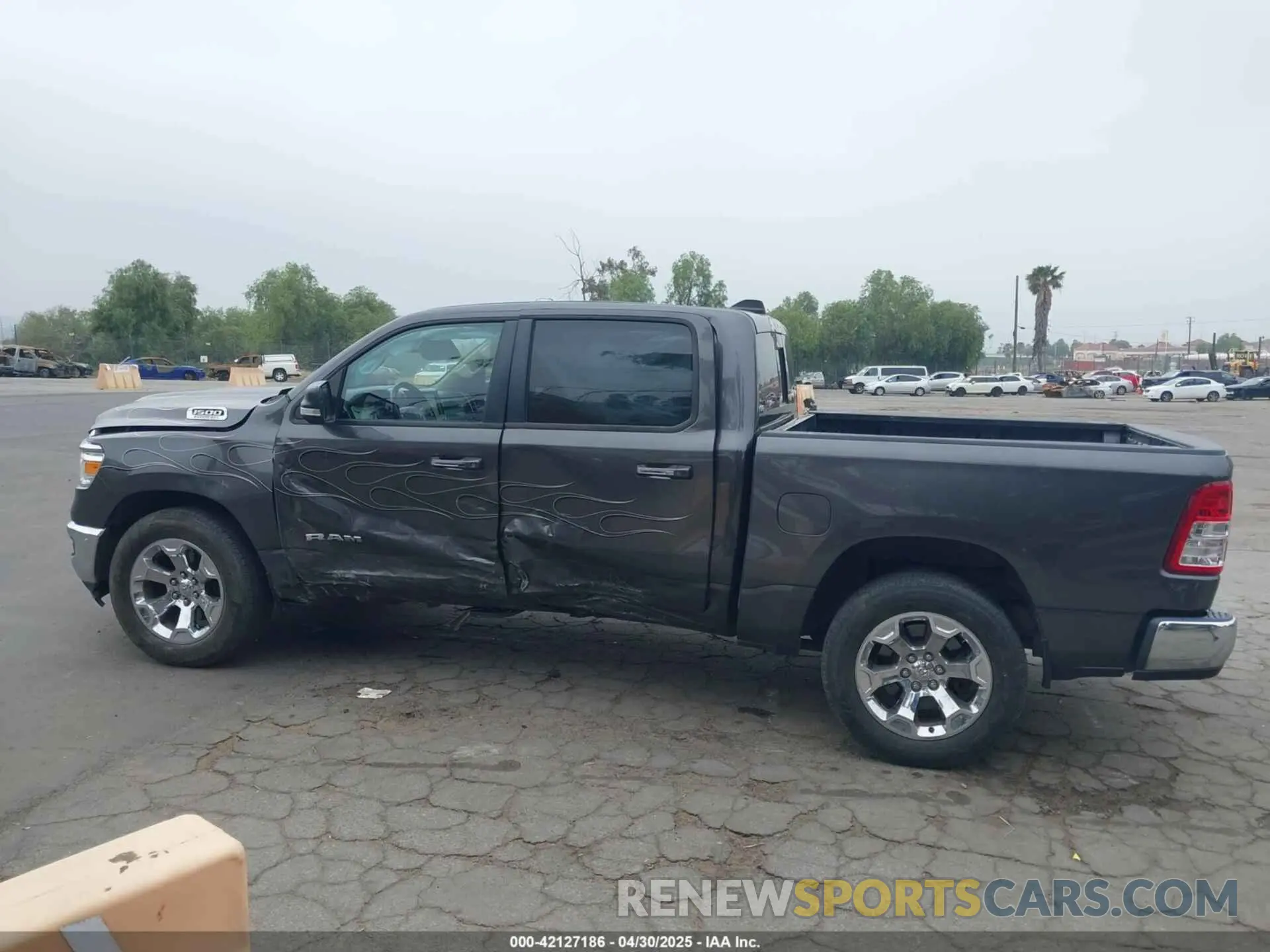 14 Photograph of a damaged car 1C6SRFFM0LN248291 RAM 1500 2020
