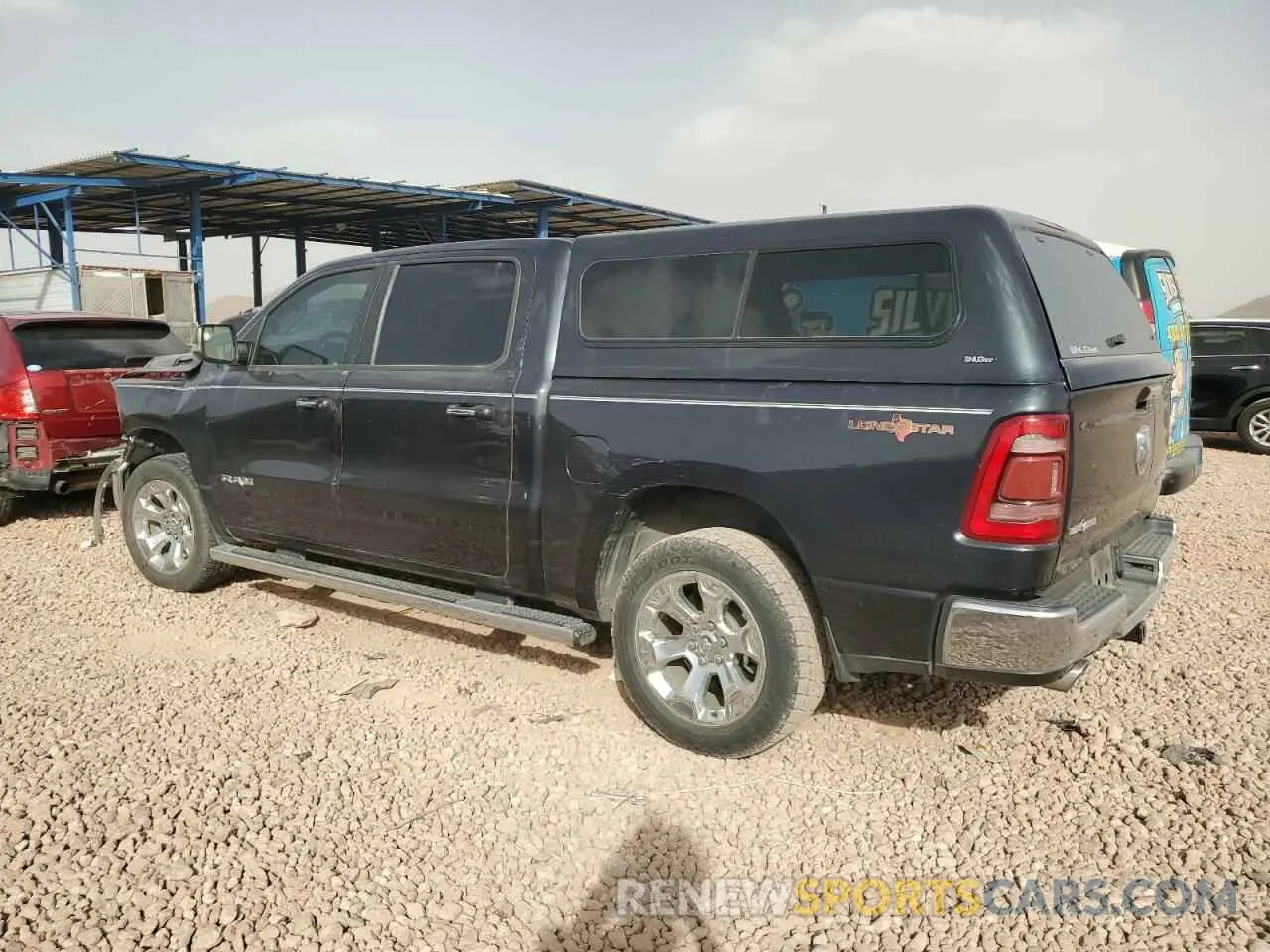 2 Photograph of a damaged car 1C6SRFFM6LN201007 RAM 1500 2020