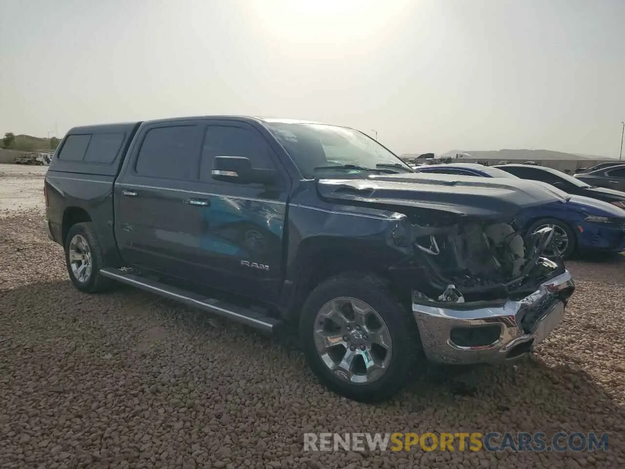 4 Photograph of a damaged car 1C6SRFFM6LN201007 RAM 1500 2020