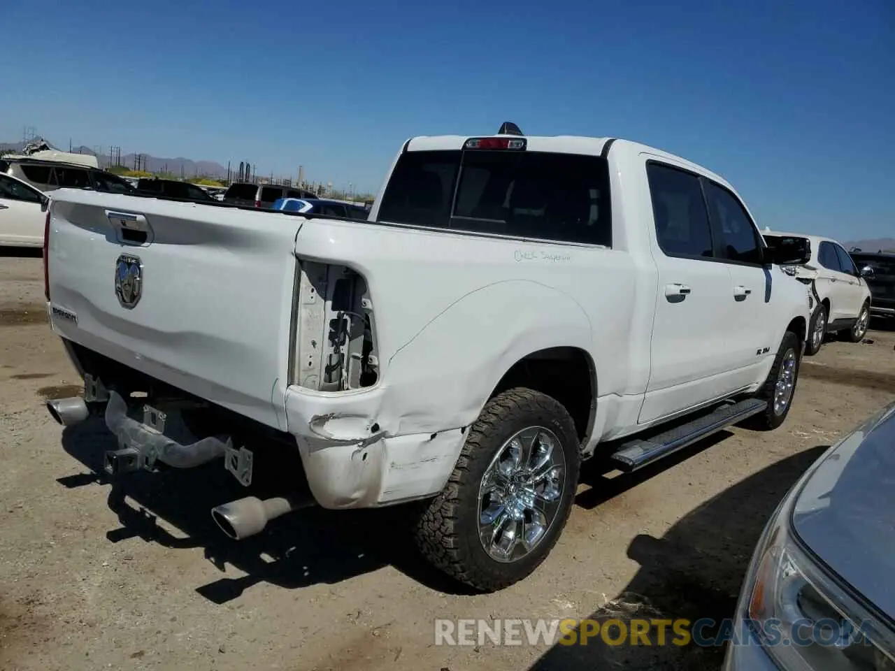 3 Photograph of a damaged car 1C6SRFFMXLN364551 RAM 1500 2020