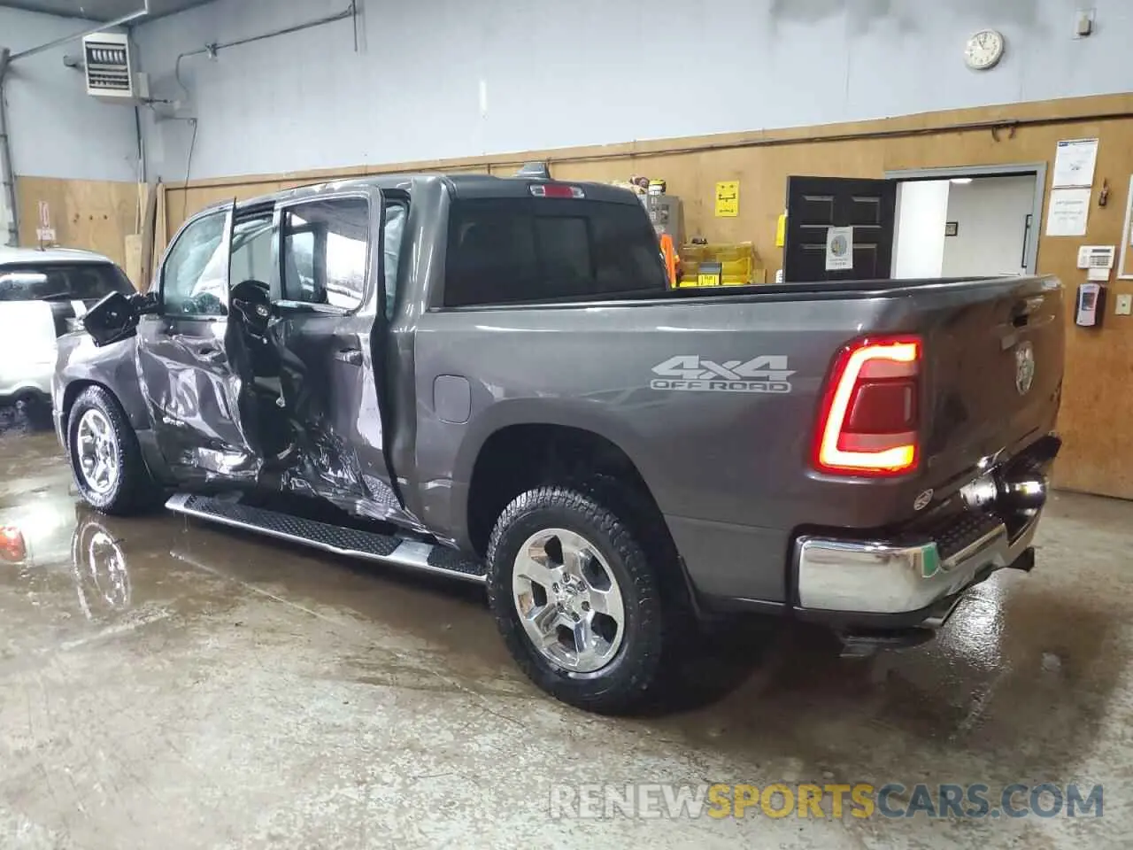 2 Photograph of a damaged car 1C6SRFFT0LN113481 RAM 1500 2020