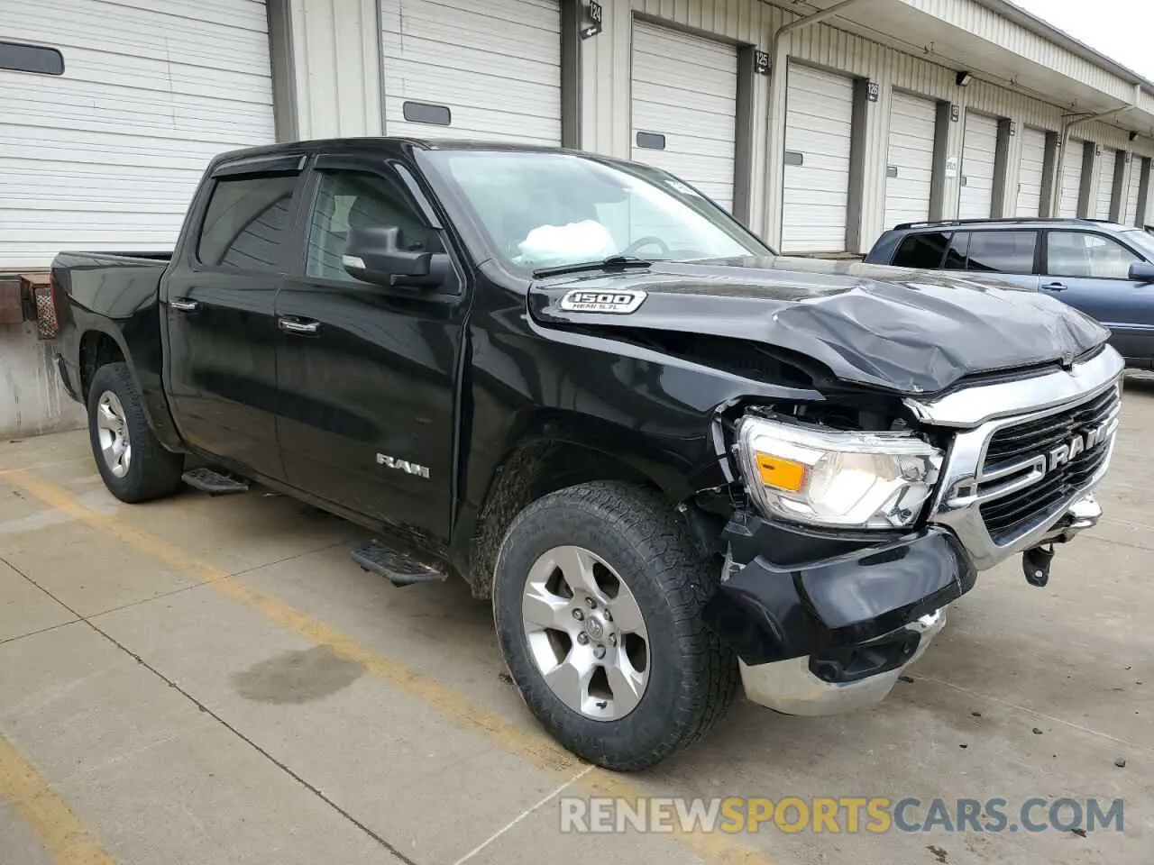 4 Photograph of a damaged car 1C6SRFFT0LN140759 RAM 1500 2020
