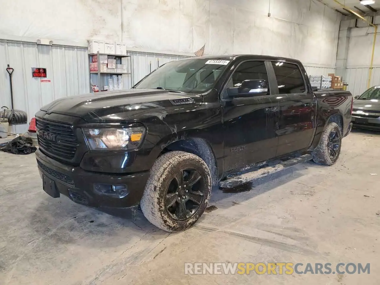 1 Photograph of a damaged car 1C6SRFFT0LN206503 RAM 1500 2020