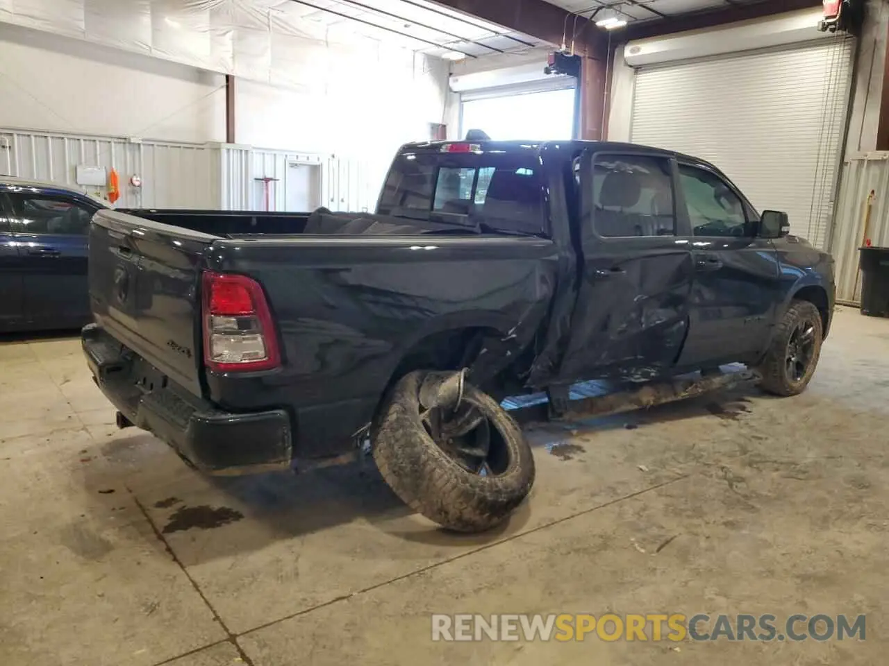 3 Photograph of a damaged car 1C6SRFFT0LN206503 RAM 1500 2020