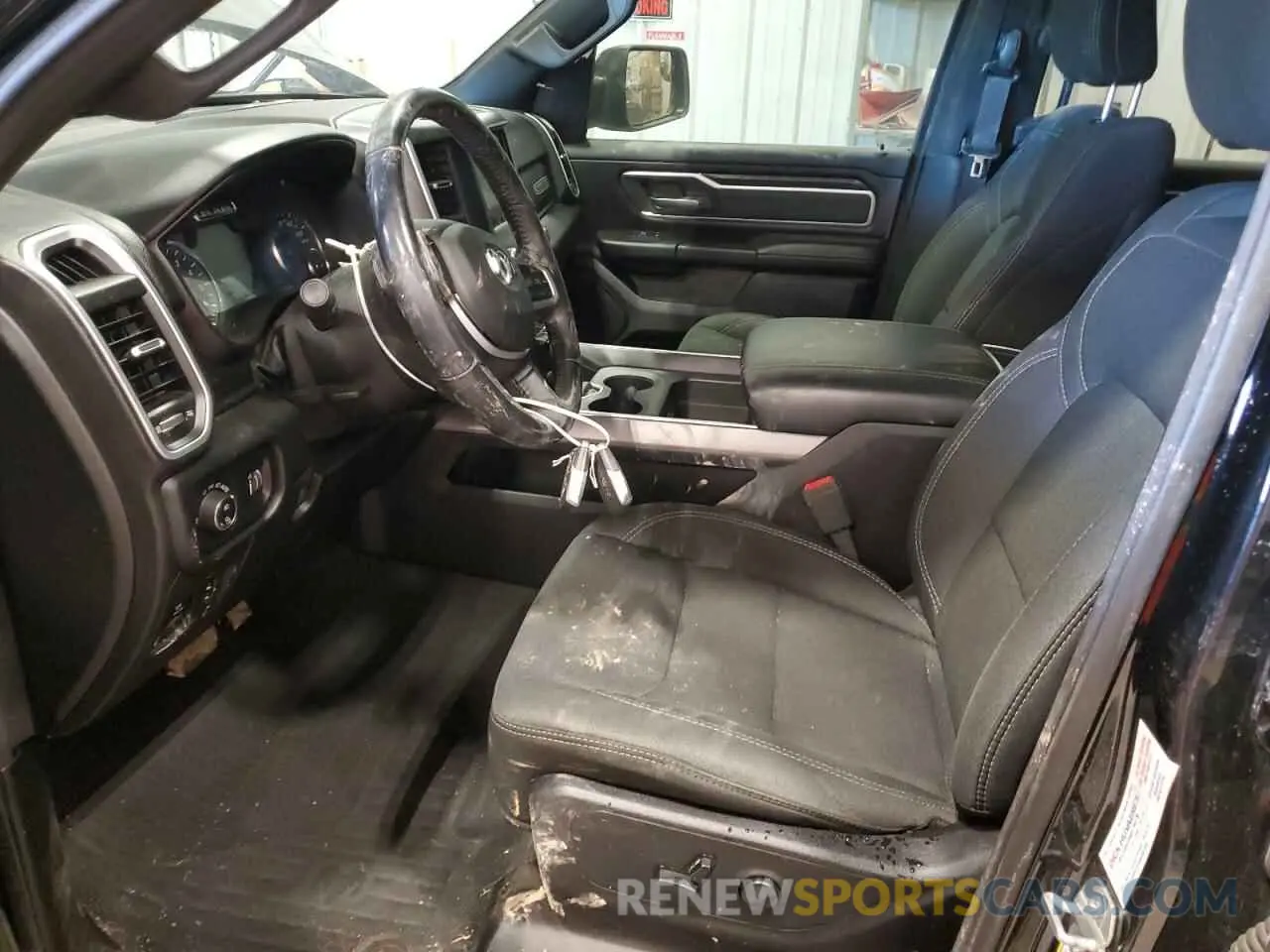 7 Photograph of a damaged car 1C6SRFFT0LN206503 RAM 1500 2020