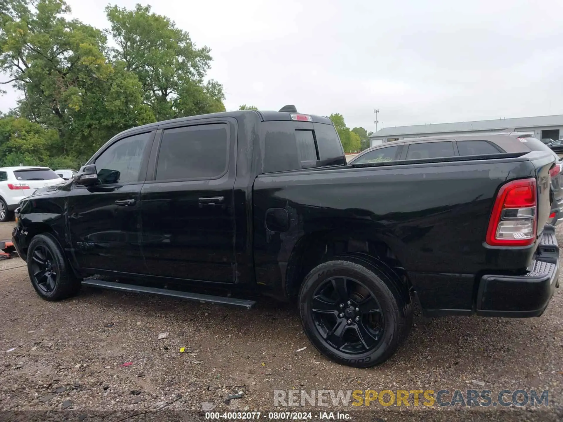 14 Photograph of a damaged car 1C6SRFFT0LN216433 RAM 1500 2020