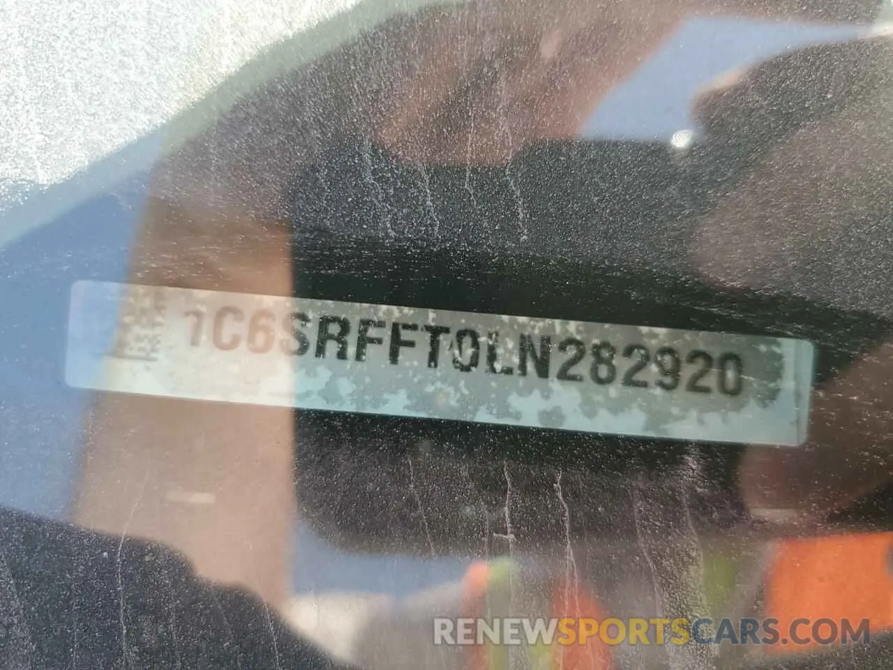 14 Photograph of a damaged car 1C6SRFFT0LN282920 RAM 1500 2020