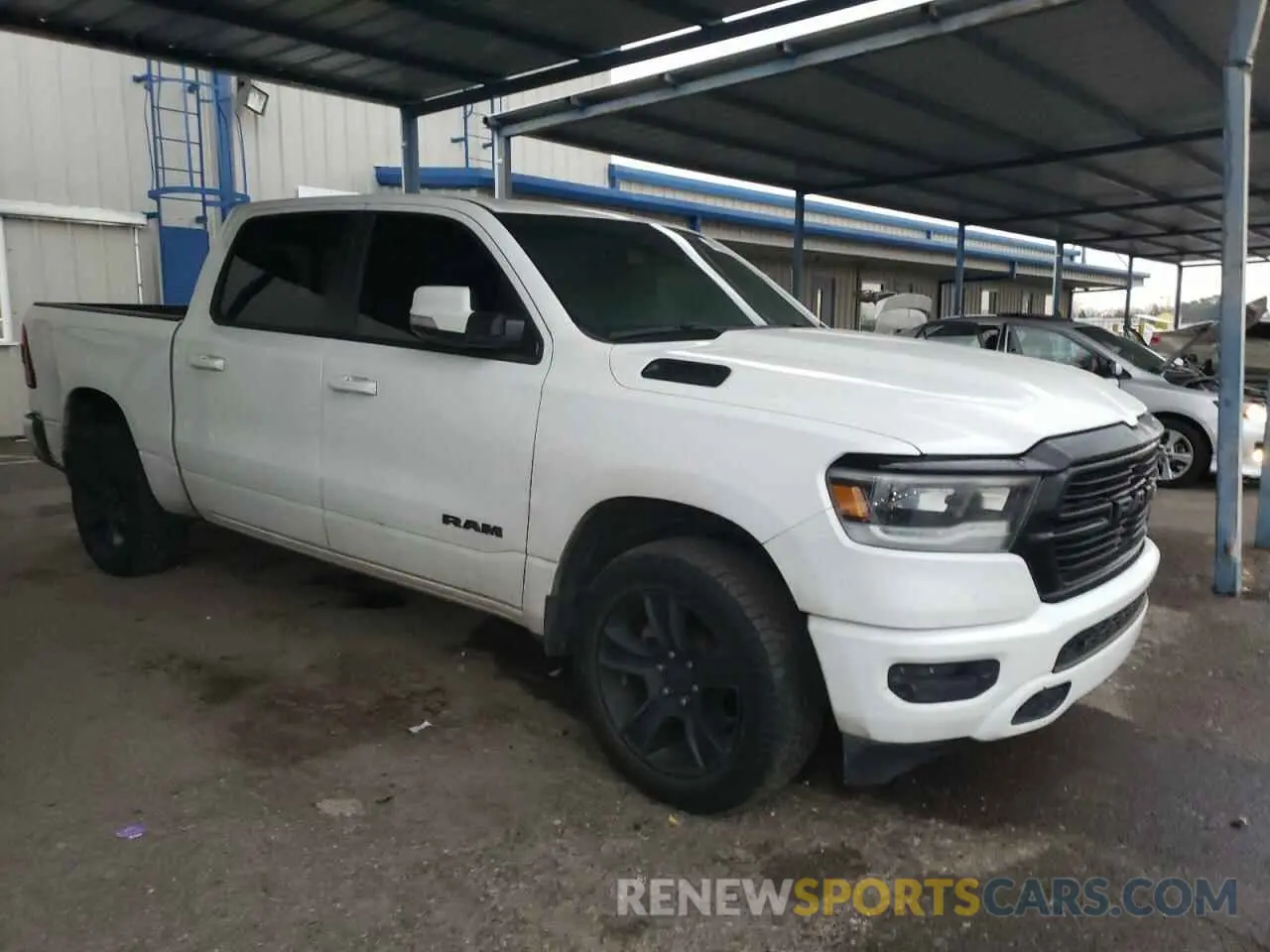 4 Photograph of a damaged car 1C6SRFFT0LN282920 RAM 1500 2020