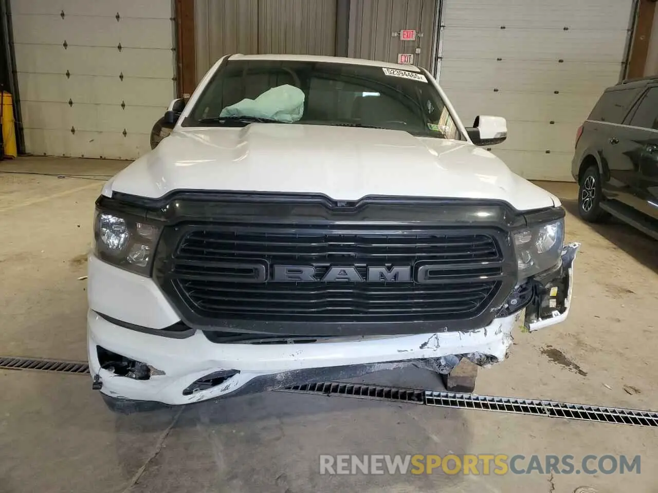 5 Photograph of a damaged car 1C6SRFFT0LN313955 RAM 1500 2020