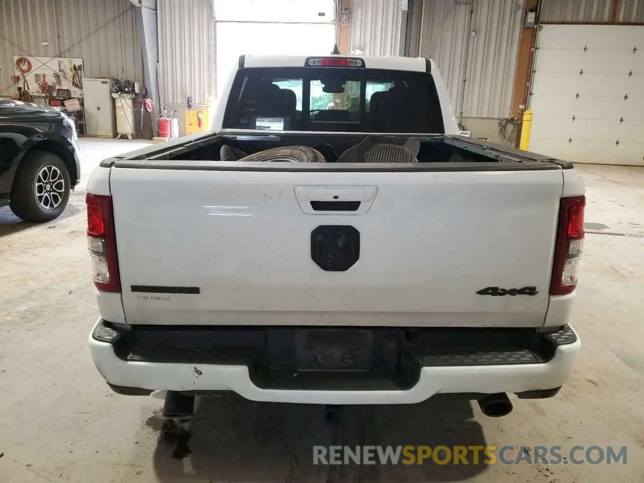 6 Photograph of a damaged car 1C6SRFFT0LN313955 RAM 1500 2020