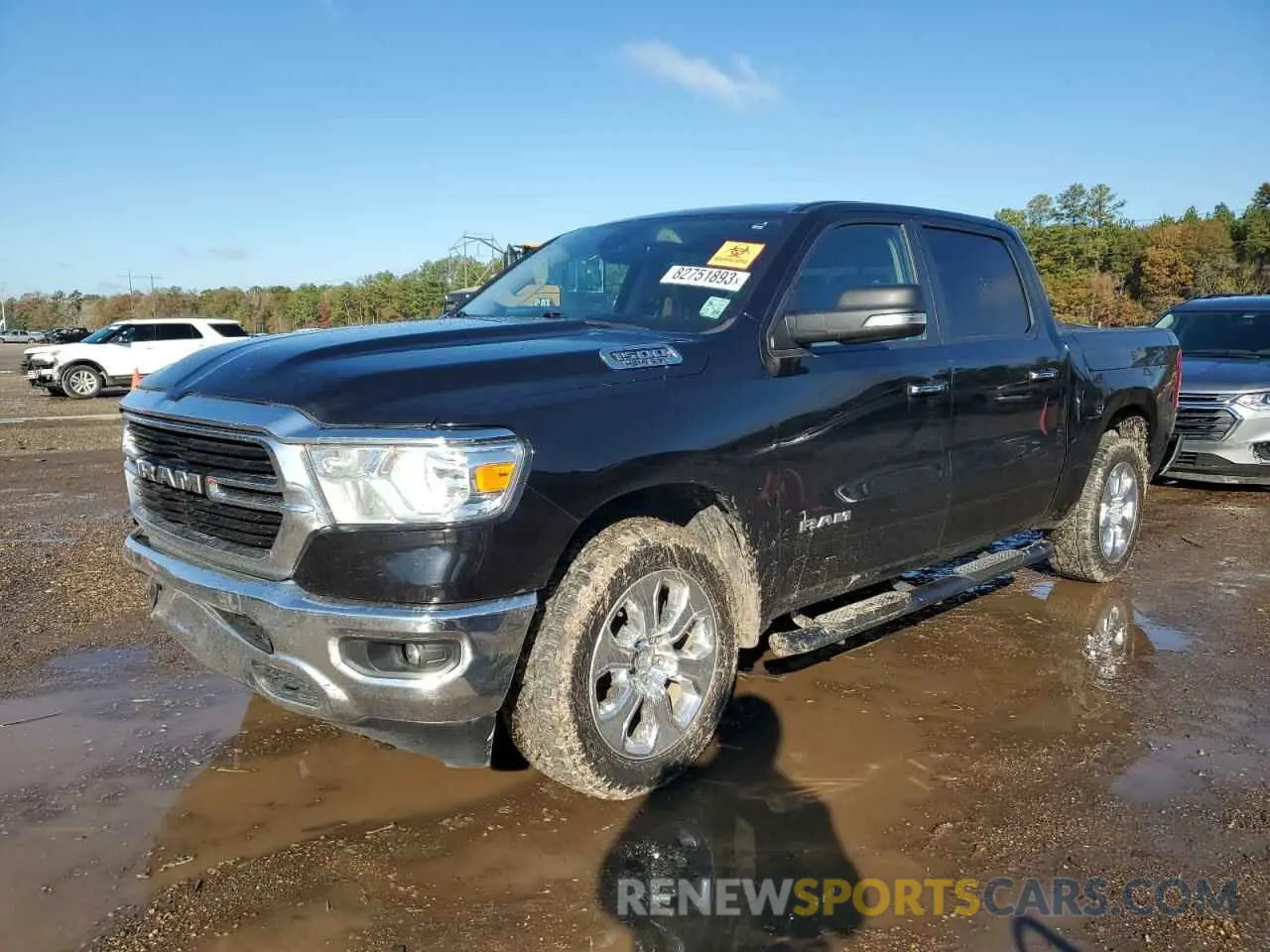 1 Photograph of a damaged car 1C6SRFFT0LN327418 RAM 1500 2020