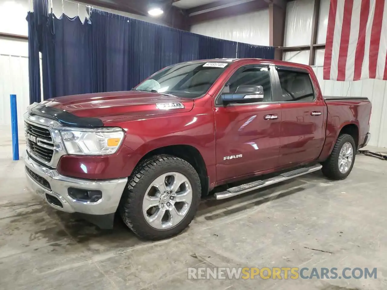 1 Photograph of a damaged car 1C6SRFFT0LN390924 RAM 1500 2020