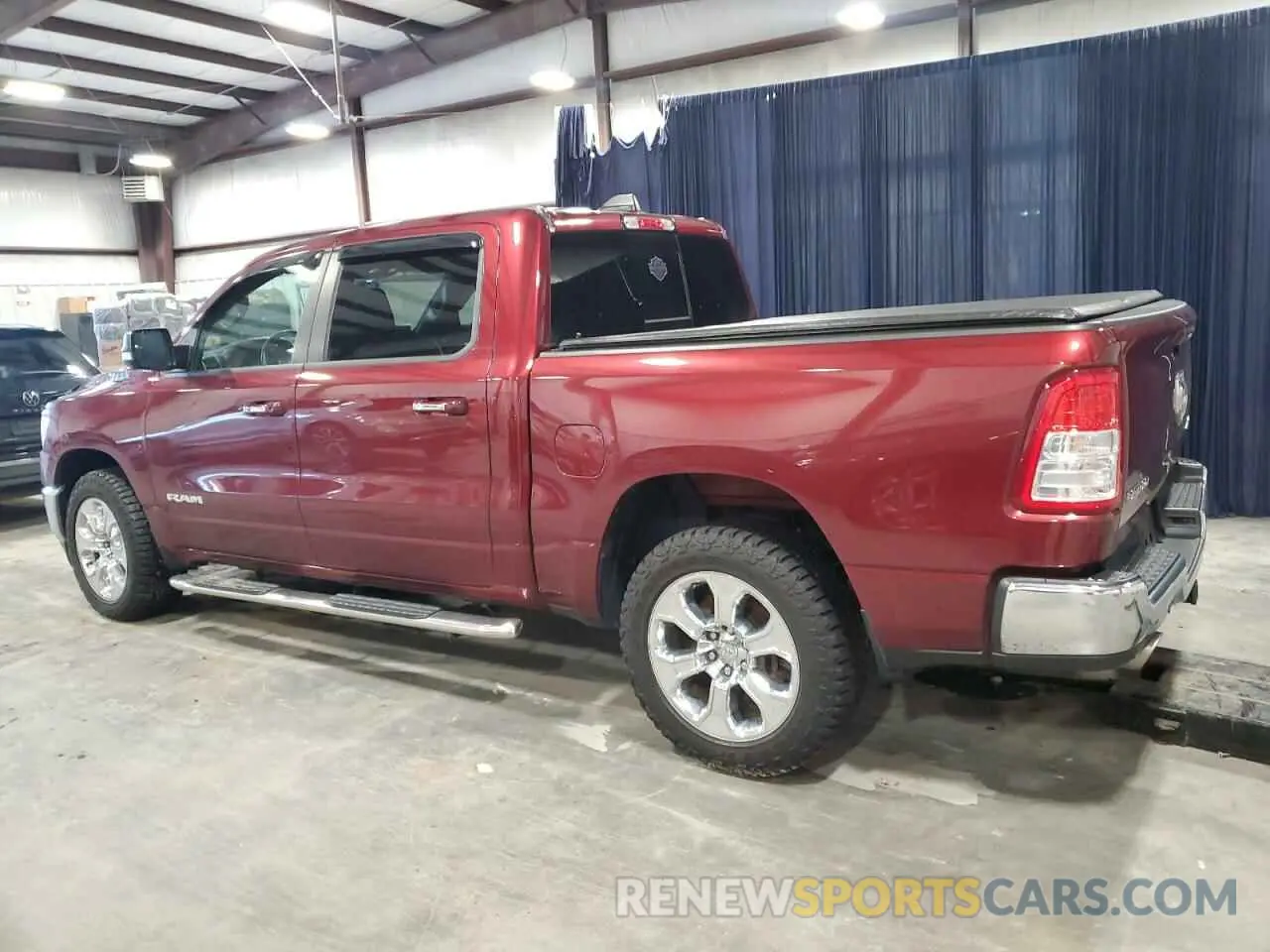2 Photograph of a damaged car 1C6SRFFT0LN390924 RAM 1500 2020