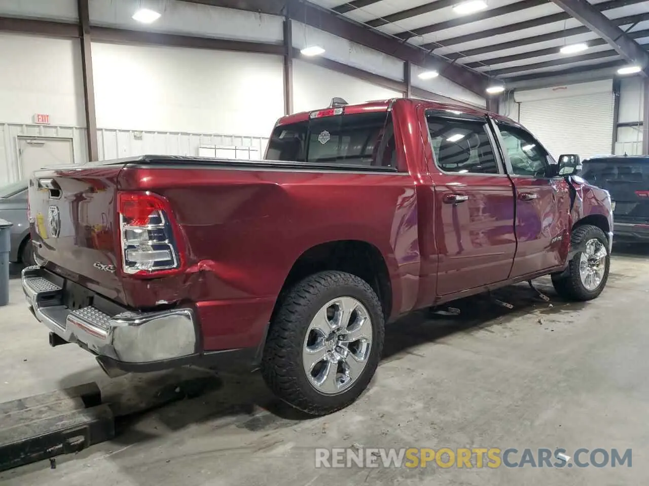 3 Photograph of a damaged car 1C6SRFFT0LN390924 RAM 1500 2020