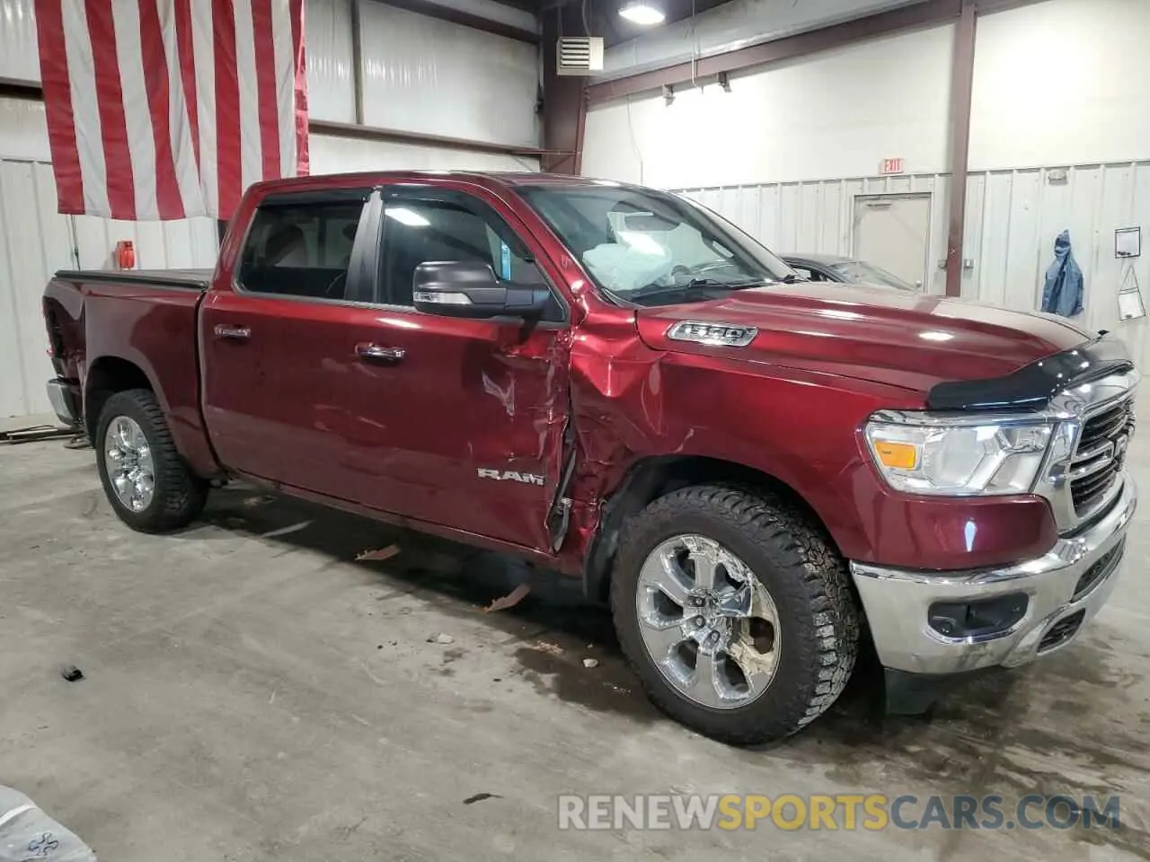 4 Photograph of a damaged car 1C6SRFFT0LN390924 RAM 1500 2020