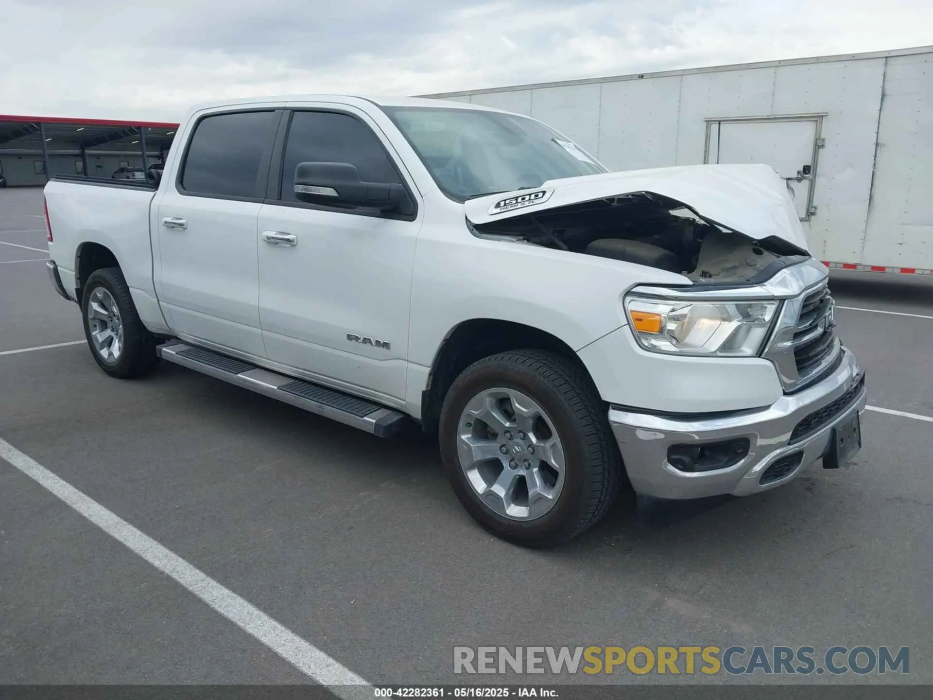 1 Photograph of a damaged car 1C6SRFFT0LN394102 RAM 1500 2020