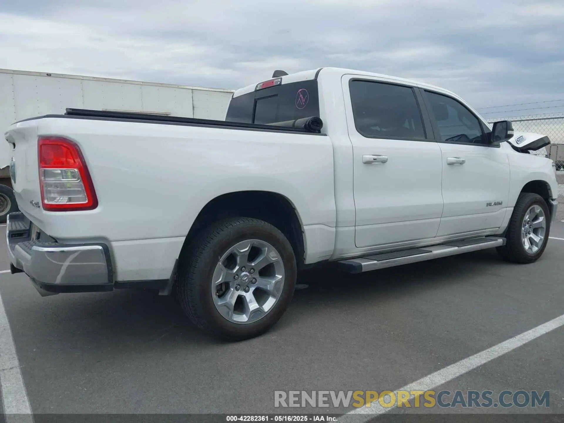 13 Photograph of a damaged car 1C6SRFFT0LN394102 RAM 1500 2020