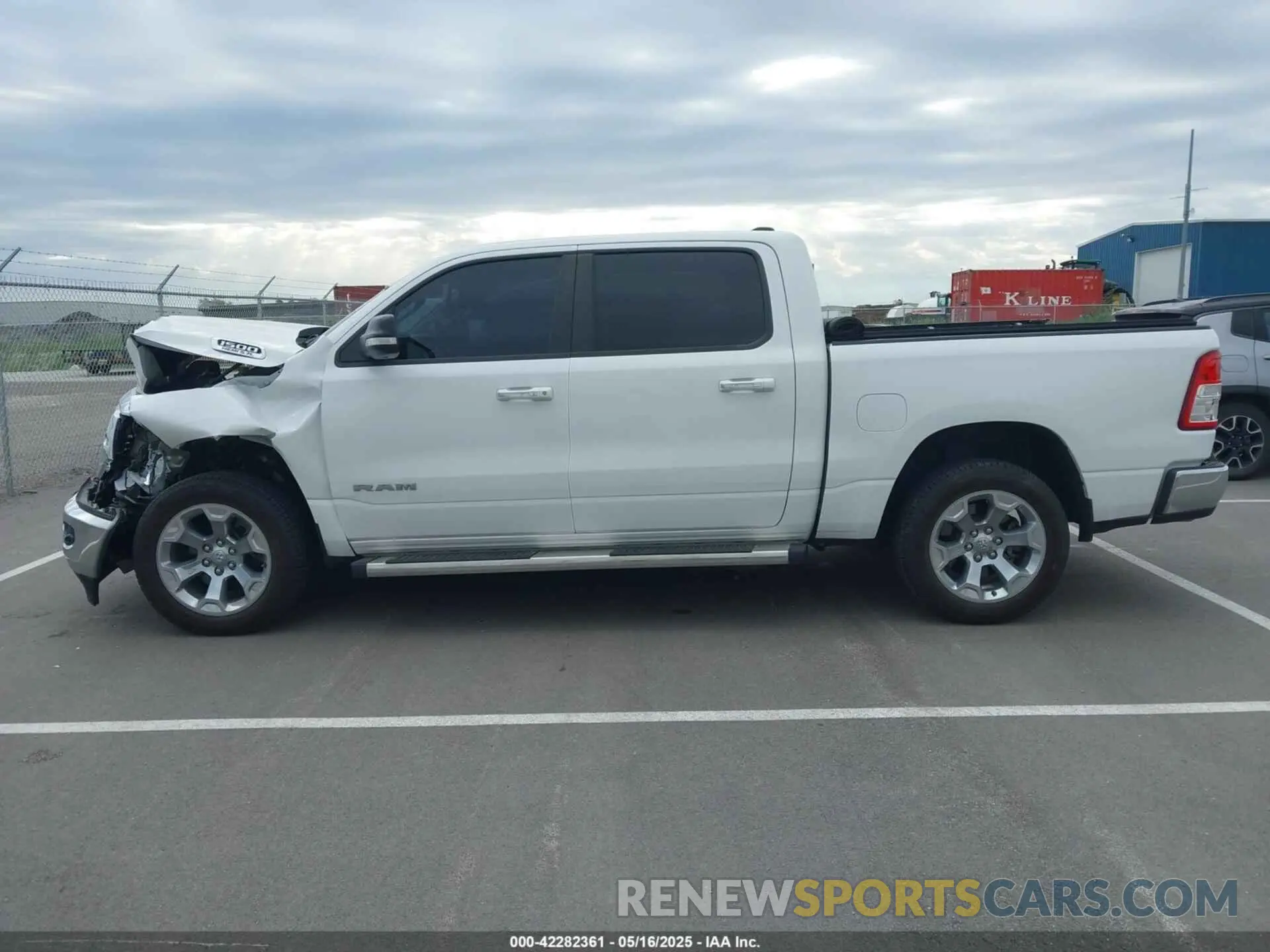 14 Photograph of a damaged car 1C6SRFFT0LN394102 RAM 1500 2020