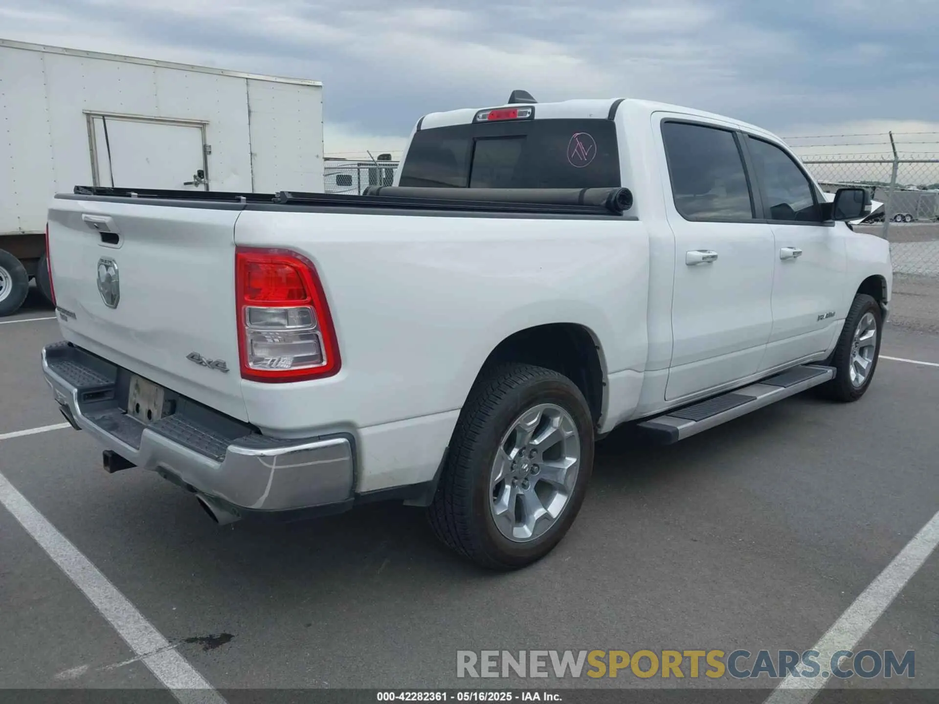 4 Photograph of a damaged car 1C6SRFFT0LN394102 RAM 1500 2020