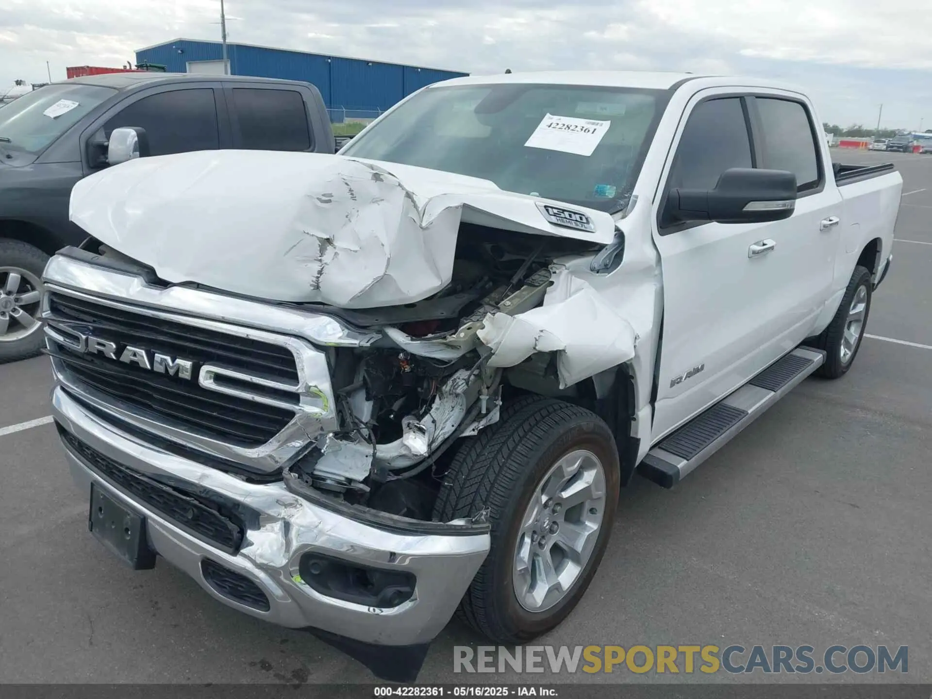 6 Photograph of a damaged car 1C6SRFFT0LN394102 RAM 1500 2020
