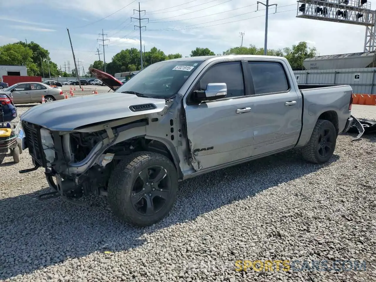 1 Photograph of a damaged car 1C6SRFFT1LN109486 RAM 1500 2020