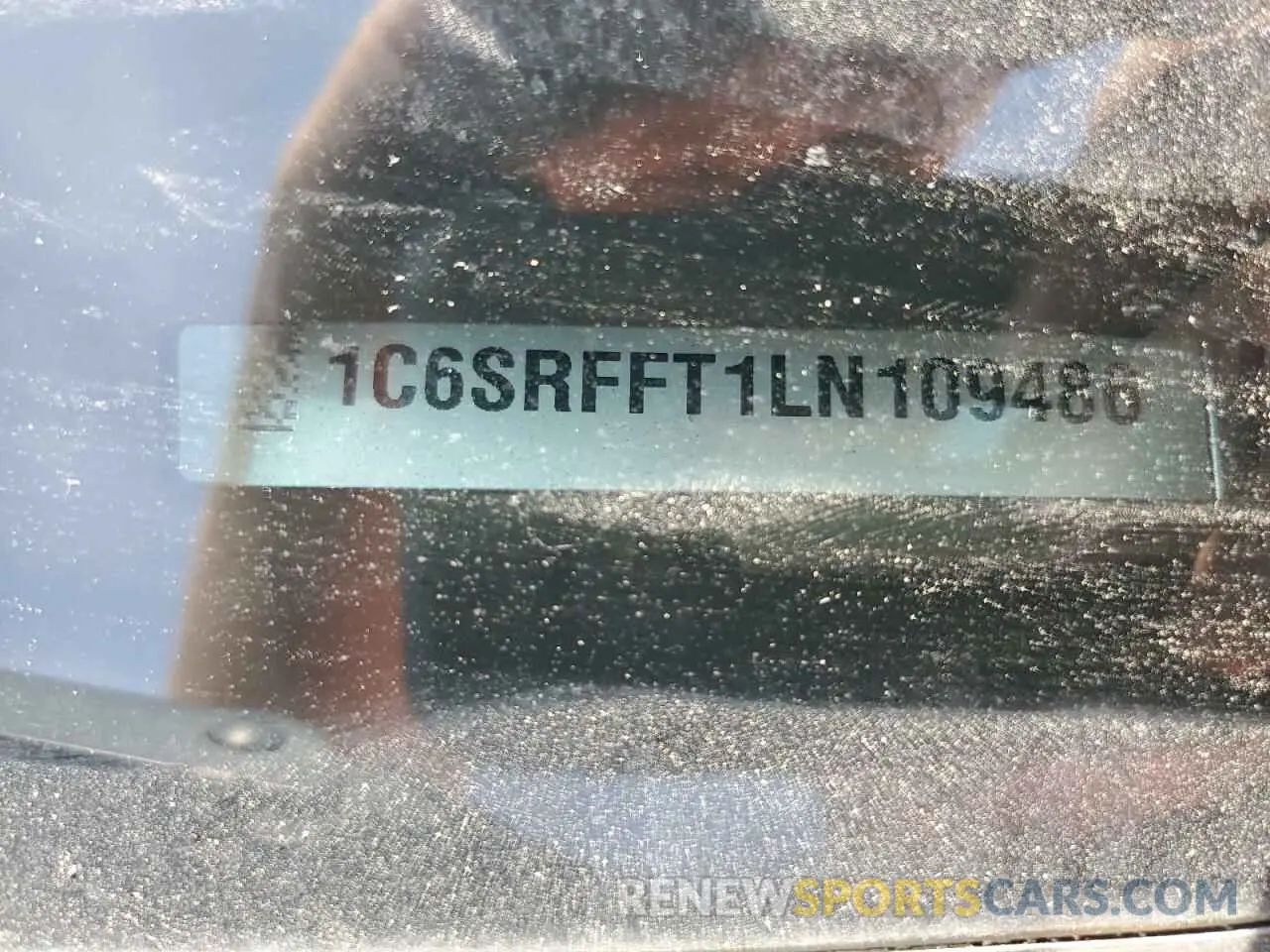 13 Photograph of a damaged car 1C6SRFFT1LN109486 RAM 1500 2020