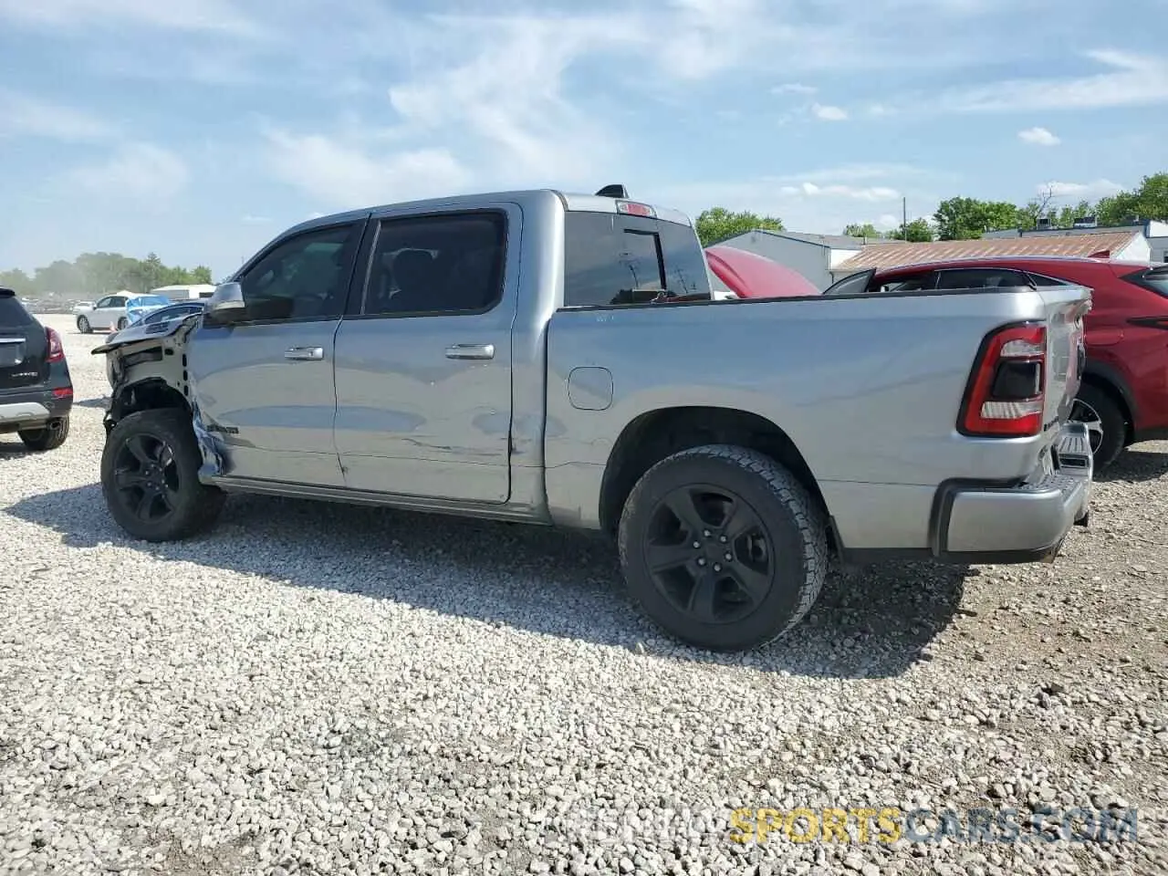 2 Photograph of a damaged car 1C6SRFFT1LN109486 RAM 1500 2020