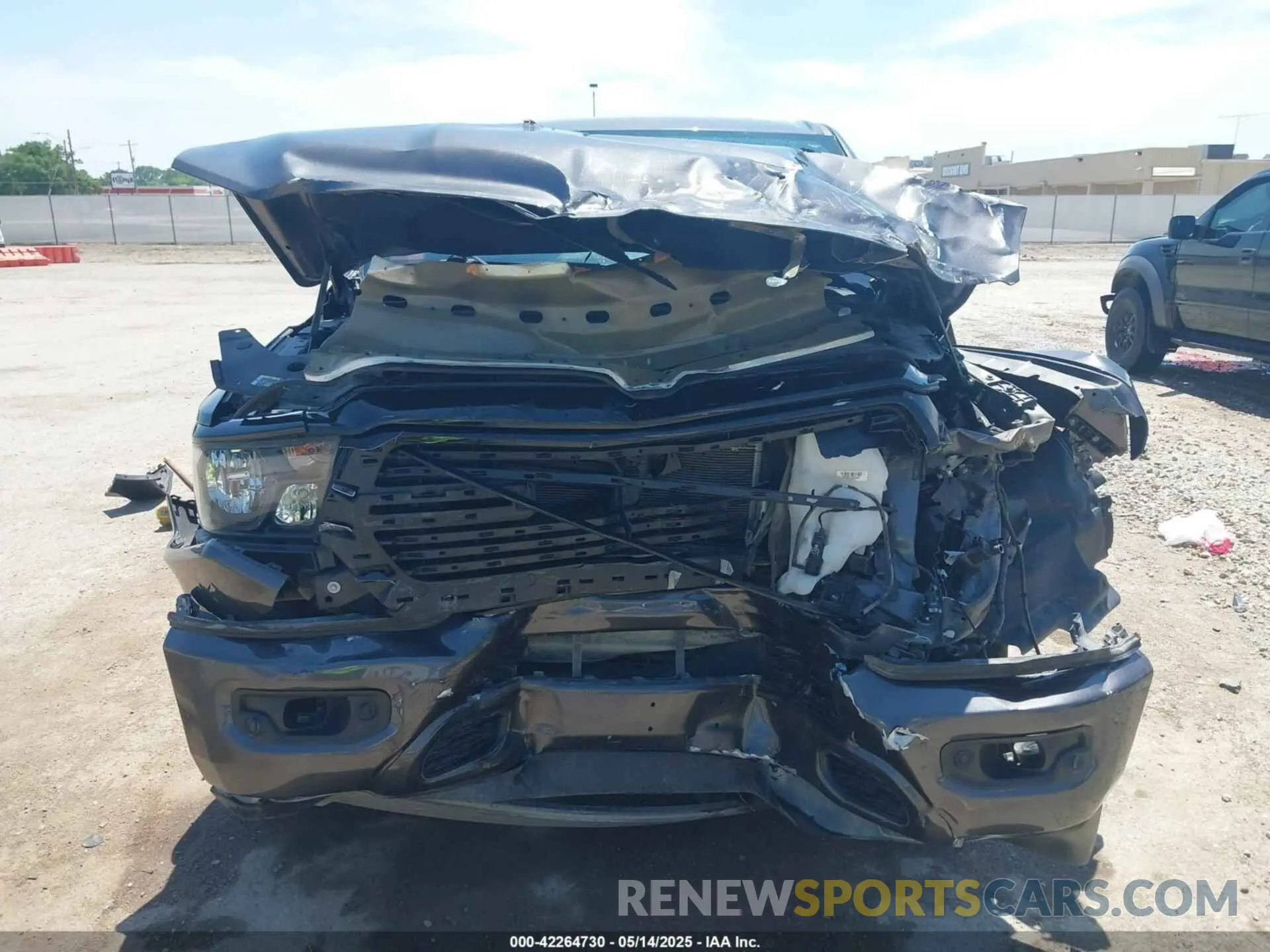 12 Photograph of a damaged car 1C6SRFFT1LN328030 RAM 1500 2020
