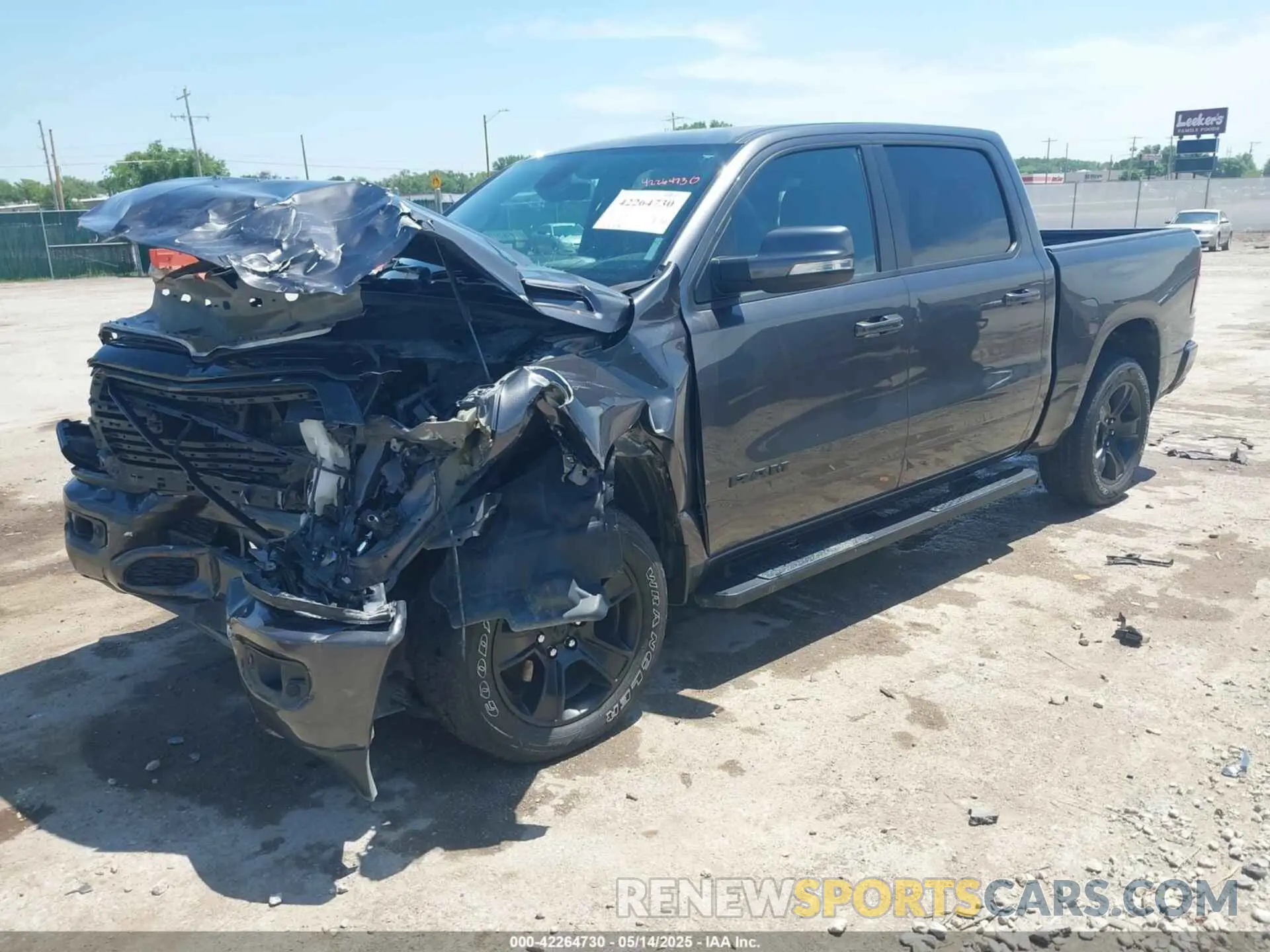 2 Photograph of a damaged car 1C6SRFFT1LN328030 RAM 1500 2020