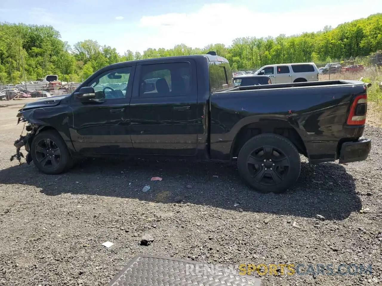 2 Photograph of a damaged car 1C6SRFFT1LN330439 RAM 1500 2020