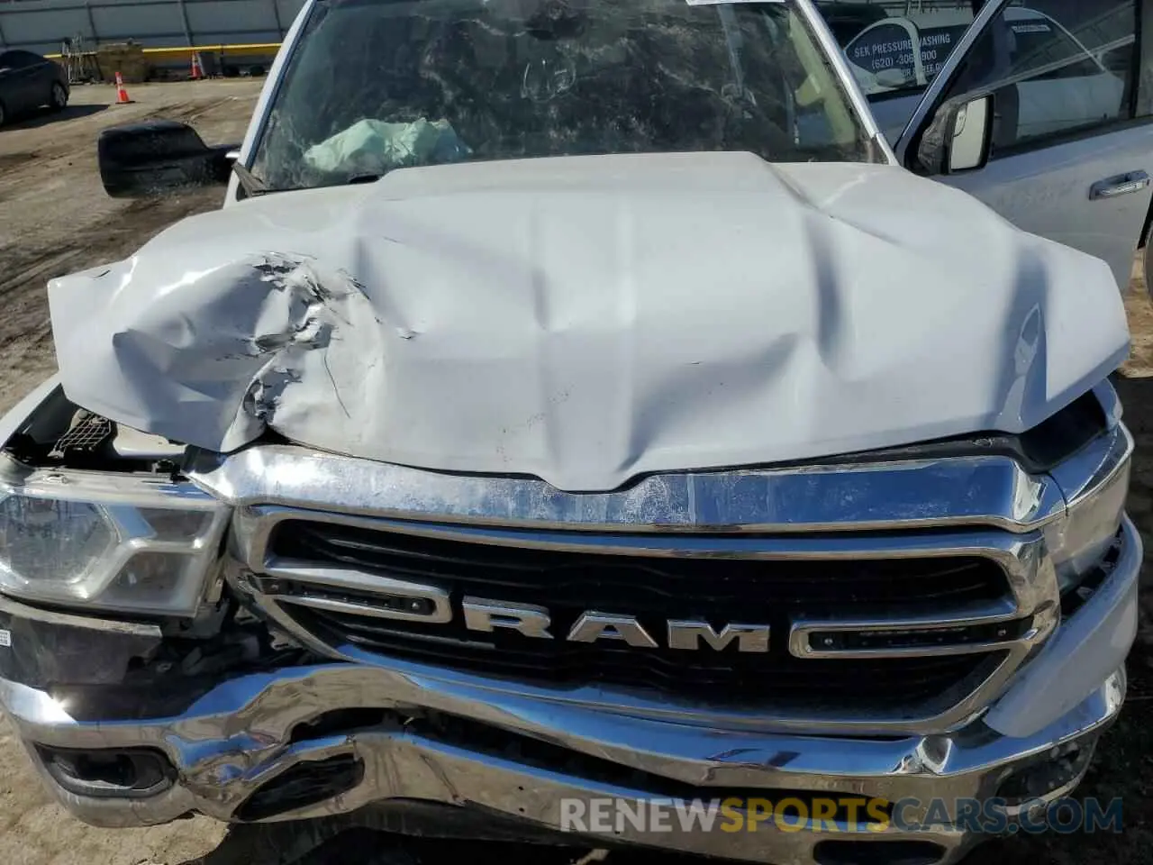 13 Photograph of a damaged car 1C6SRFFT1LN332286 RAM 1500 2020