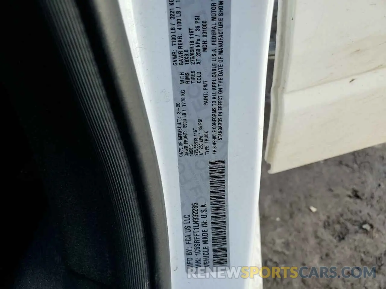 14 Photograph of a damaged car 1C6SRFFT1LN332286 RAM 1500 2020