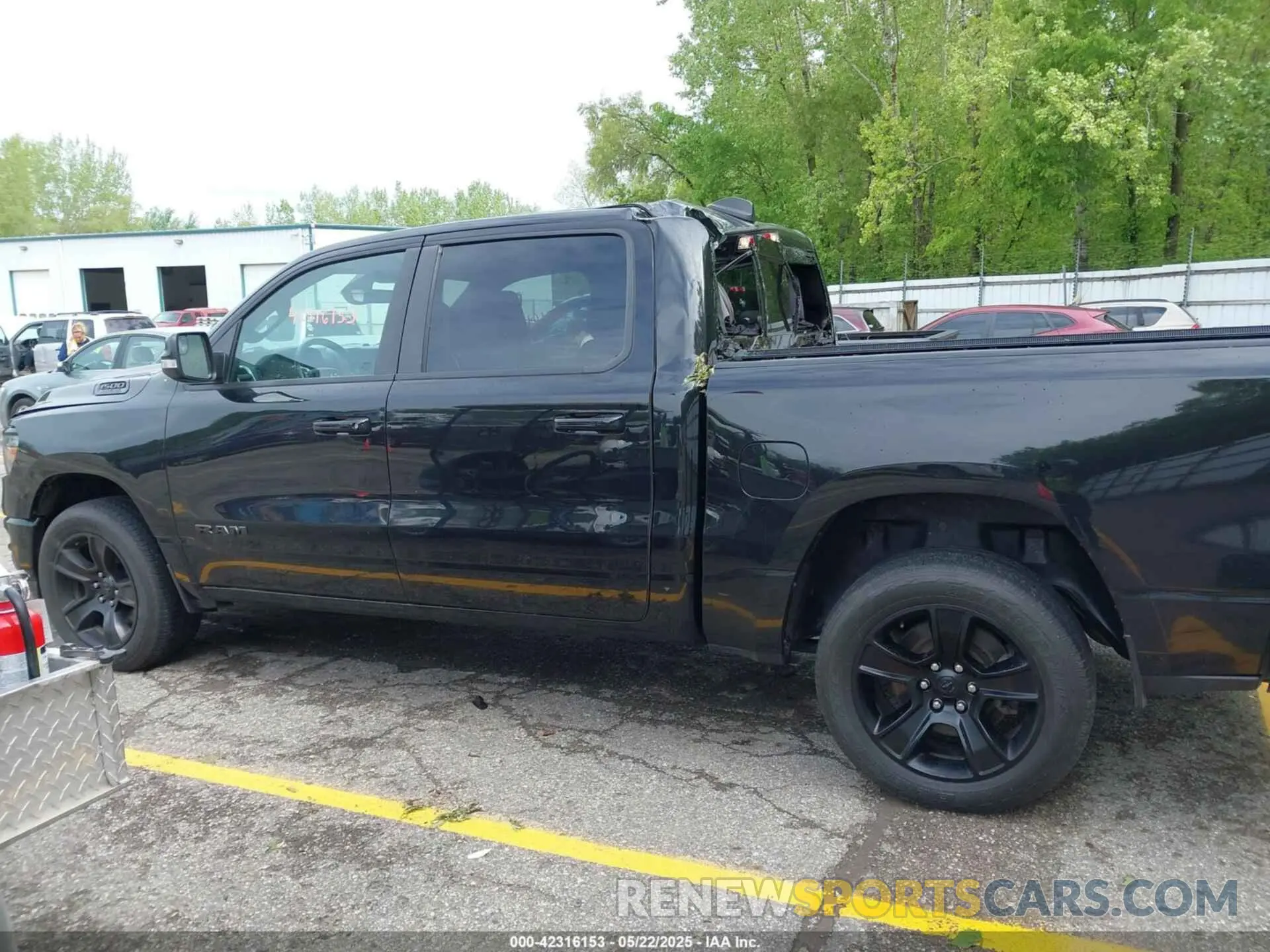 14 Photograph of a damaged car 1C6SRFFT1LN345619 RAM 1500 2020