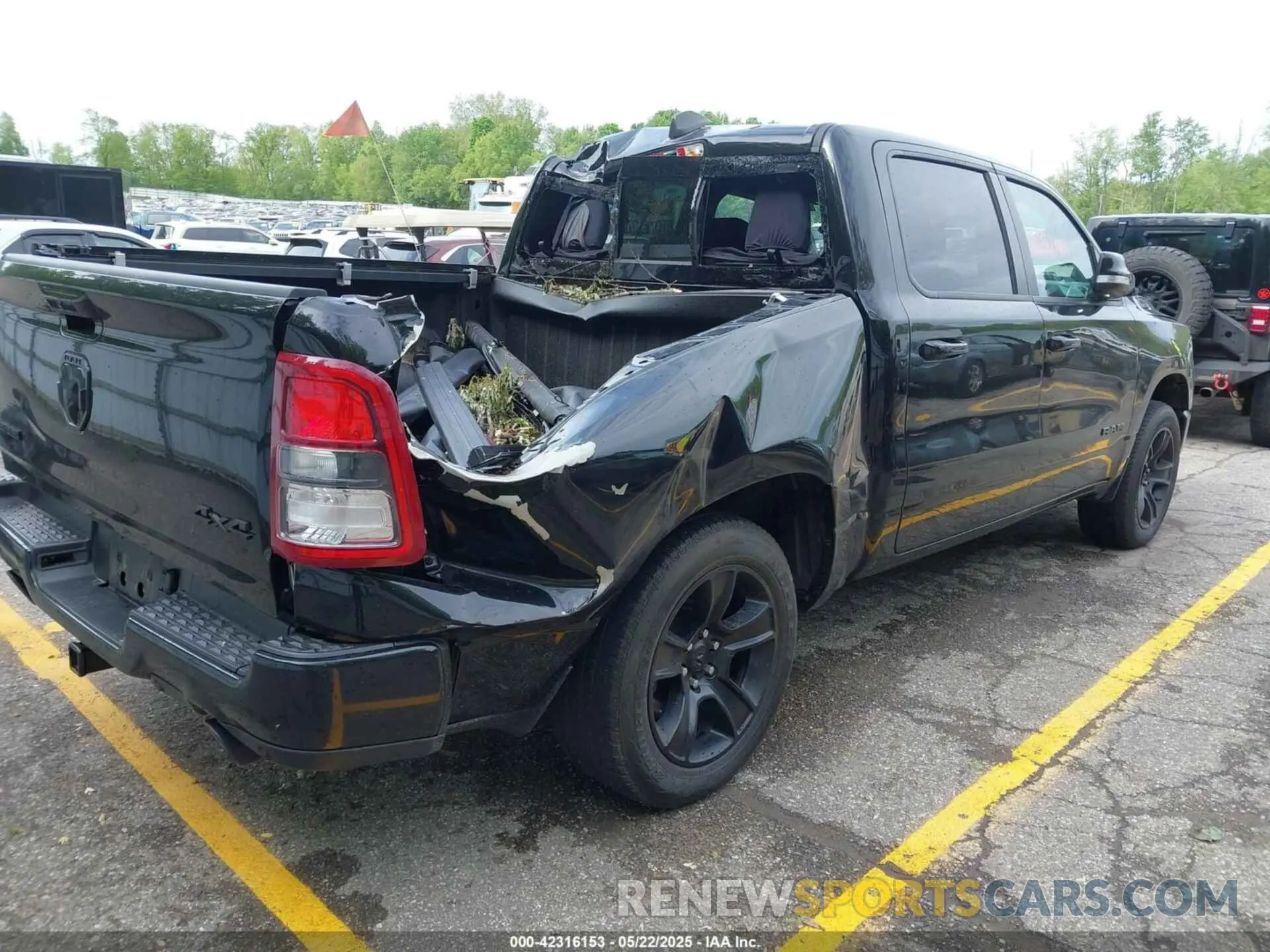 4 Photograph of a damaged car 1C6SRFFT1LN345619 RAM 1500 2020