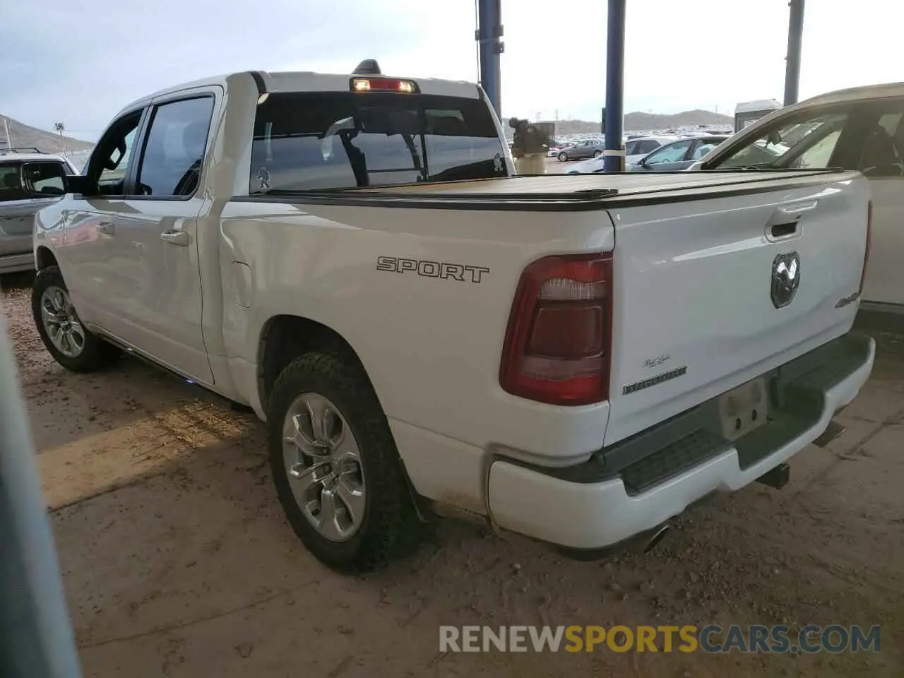 2 Photograph of a damaged car 1C6SRFFT1LN393444 RAM 1500 2020