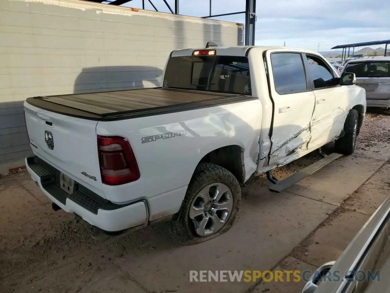 3 Photograph of a damaged car 1C6SRFFT1LN393444 RAM 1500 2020