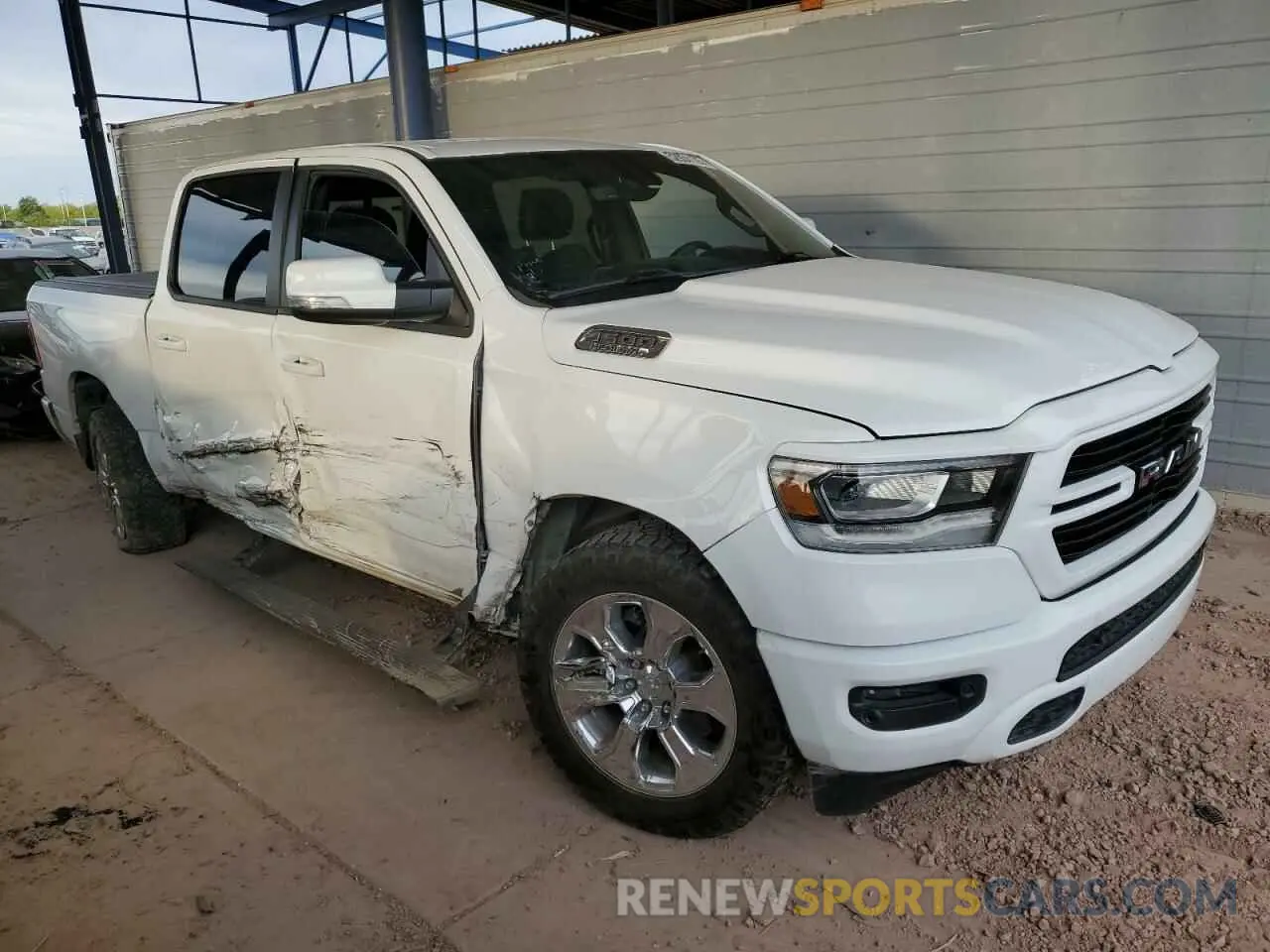 4 Photograph of a damaged car 1C6SRFFT1LN393444 RAM 1500 2020