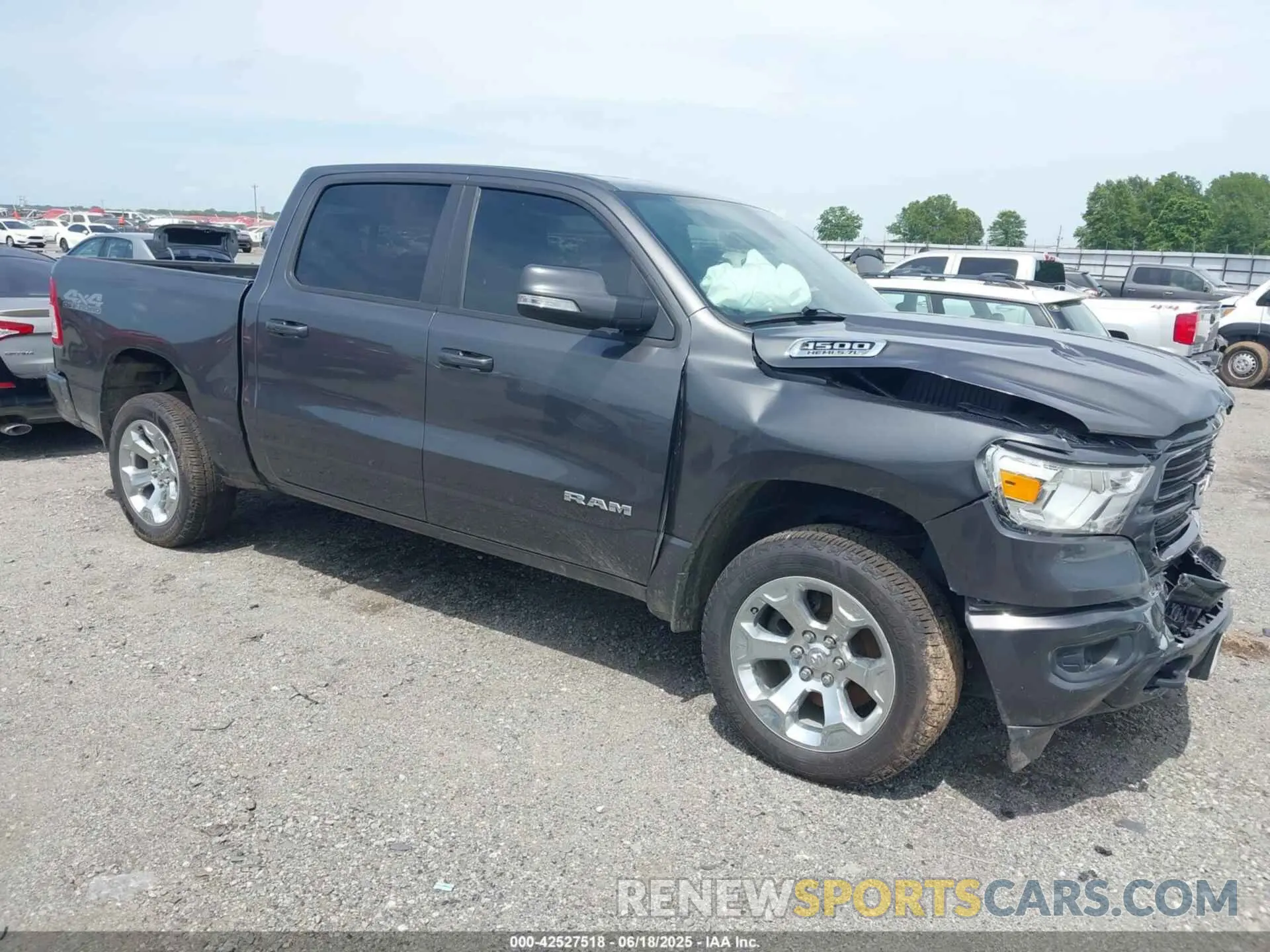 1 Photograph of a damaged car 1C6SRFFT2LN103468 RAM 1500 2020
