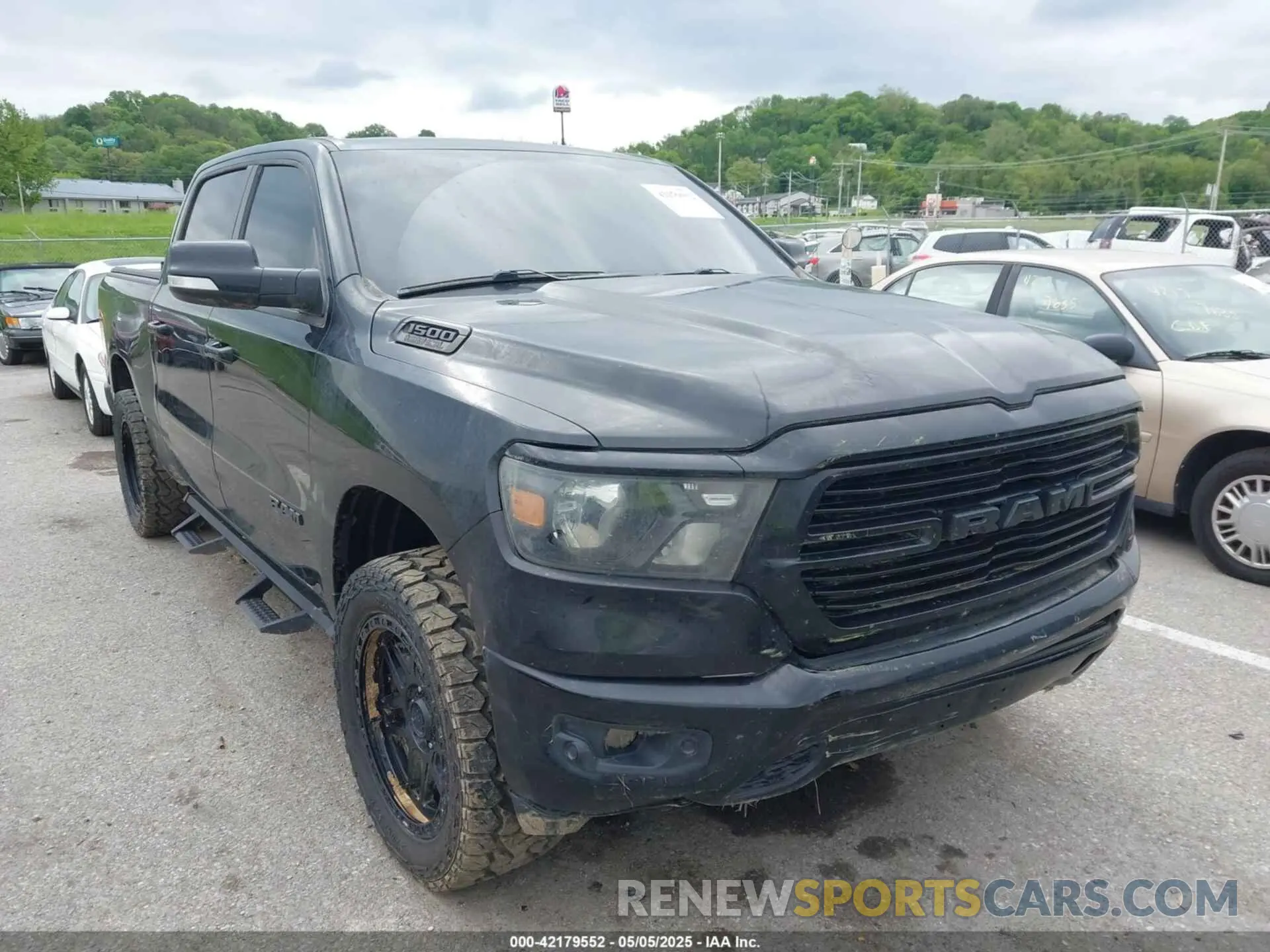 1 Photograph of a damaged car 1C6SRFFT2LN159572 RAM 1500 2020