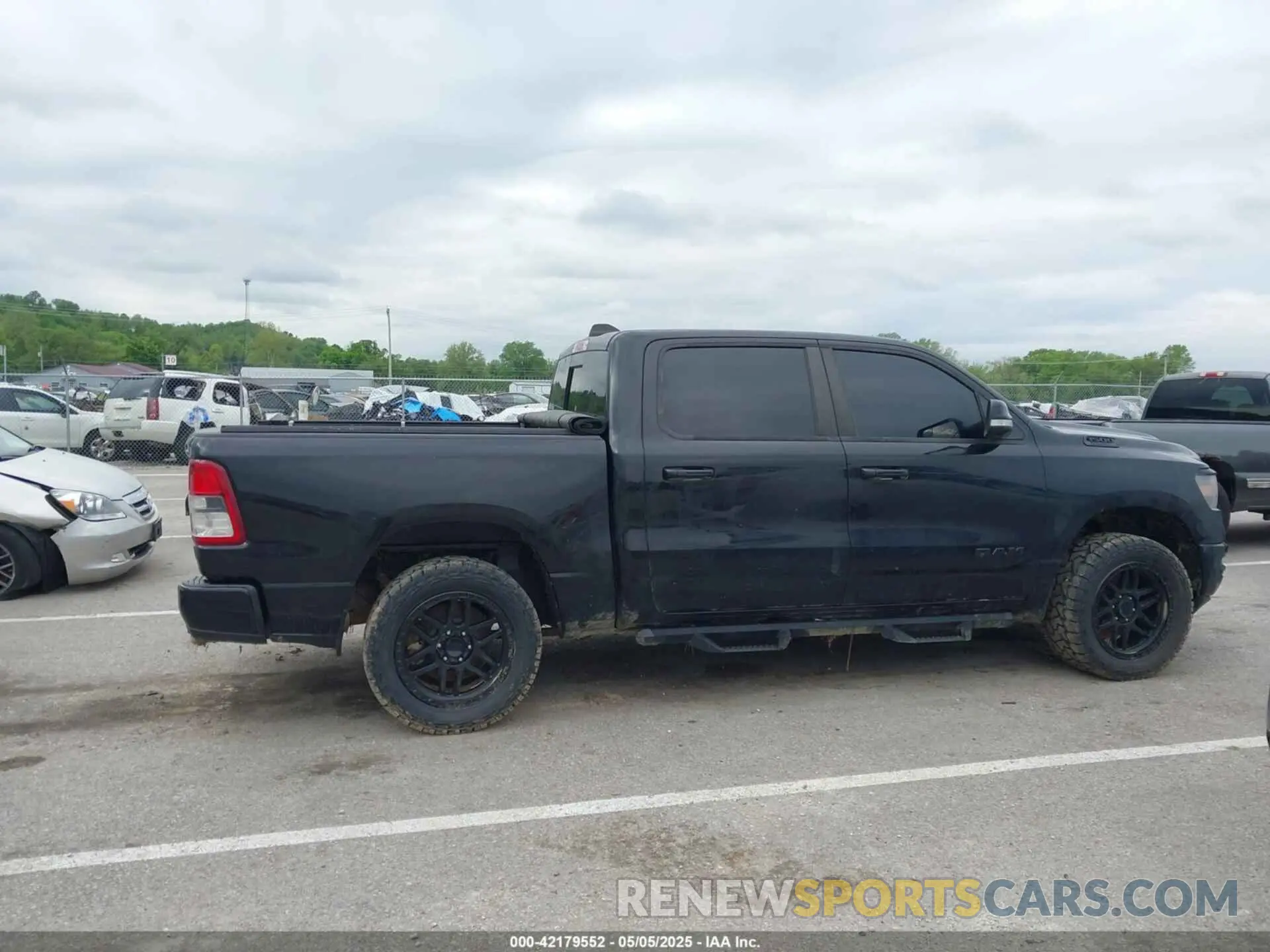 12 Photograph of a damaged car 1C6SRFFT2LN159572 RAM 1500 2020